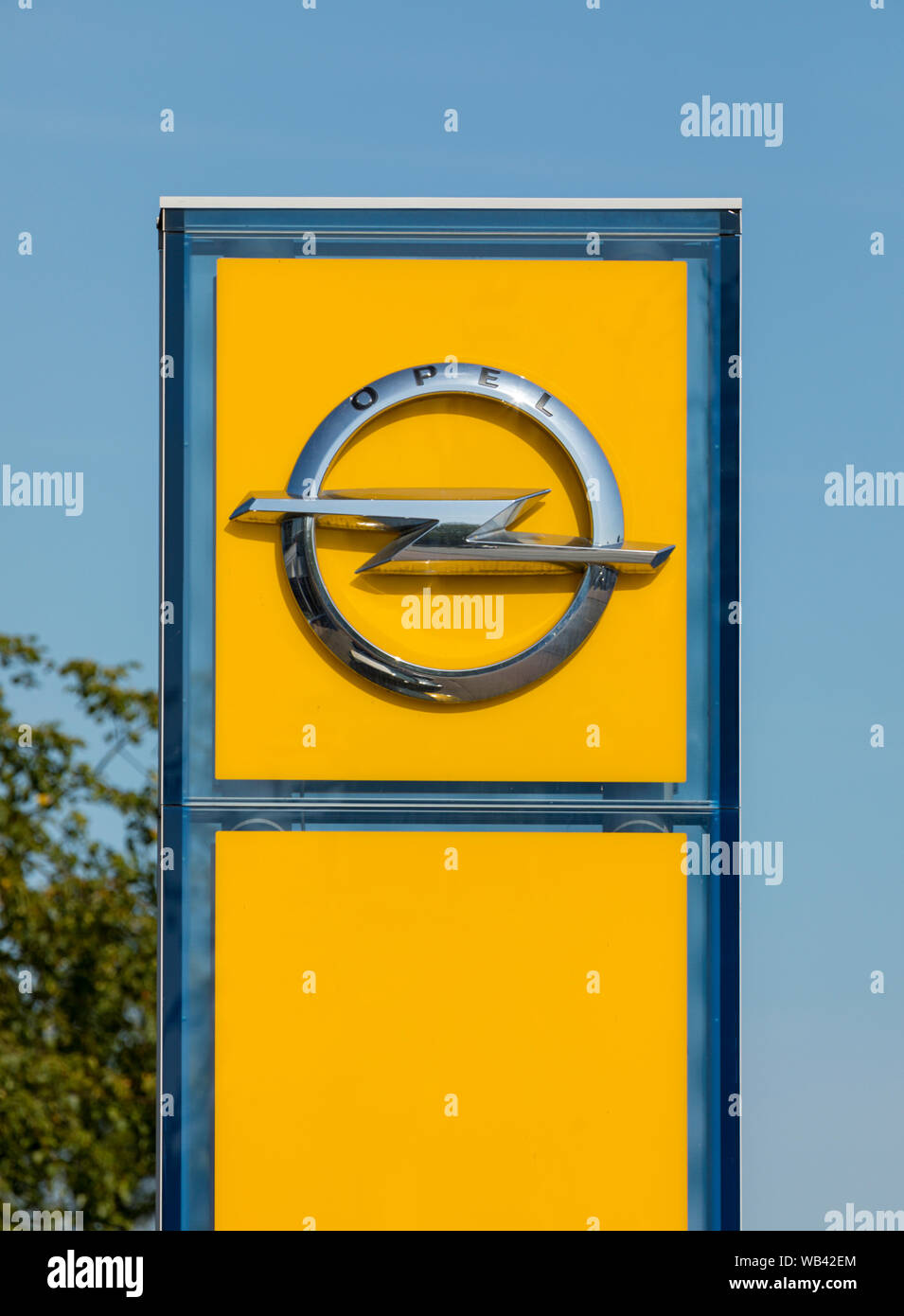 Stade, Germany - August 22, 2019: Signage on pole identifying OPEL cars dealership. Stock Photo