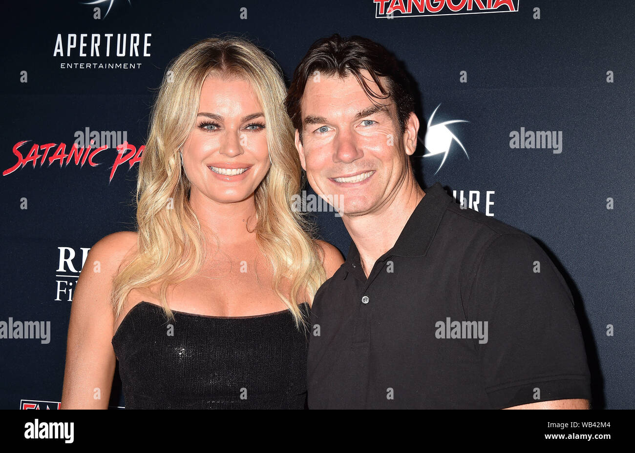 HOLLYWOOD, CA - AUGUST 23: Rebecca Romijn and Jerry O'Connell arrive at