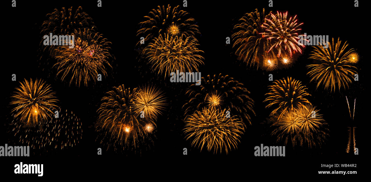 multicolored flashes of festive fireworks isolated on black background, eight options Stock Photo