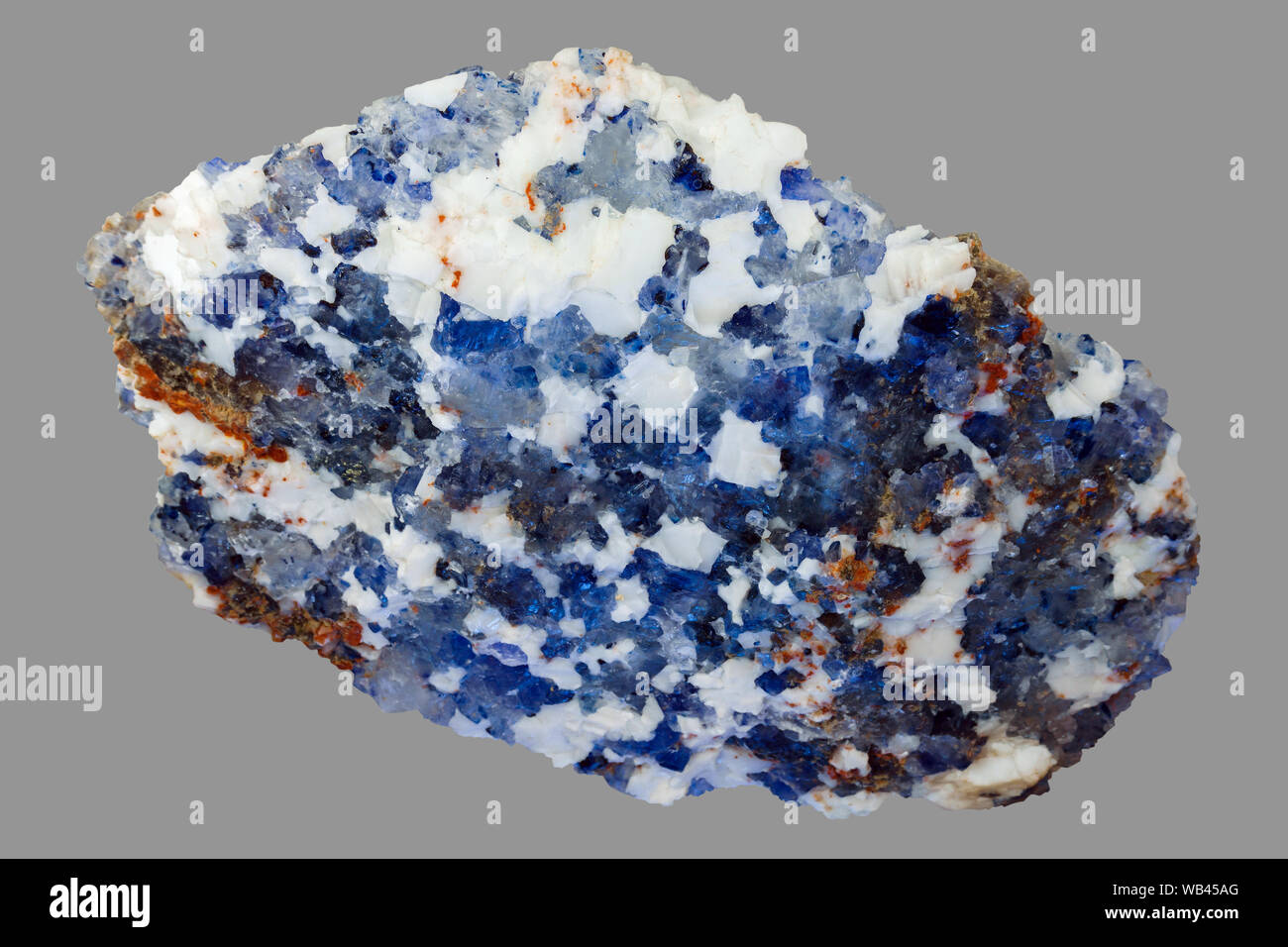 white and blue piece of halite mineral, natural crystalline rock salt