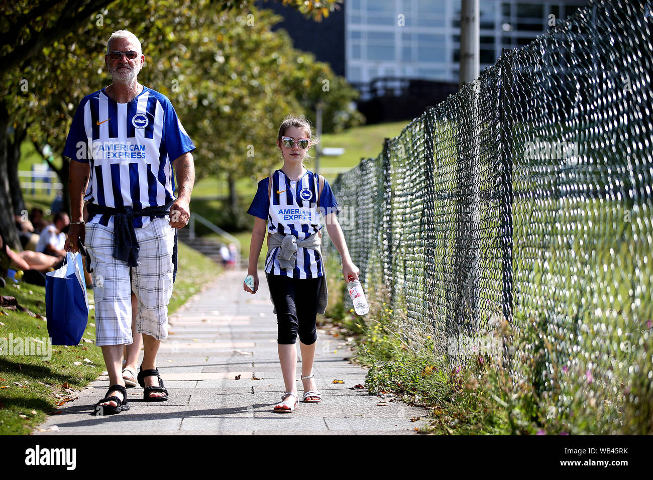 Brighton & Hove Albion fans arrive for the Premier League match at the AMEX Stadium, Brighton. Stock Photo