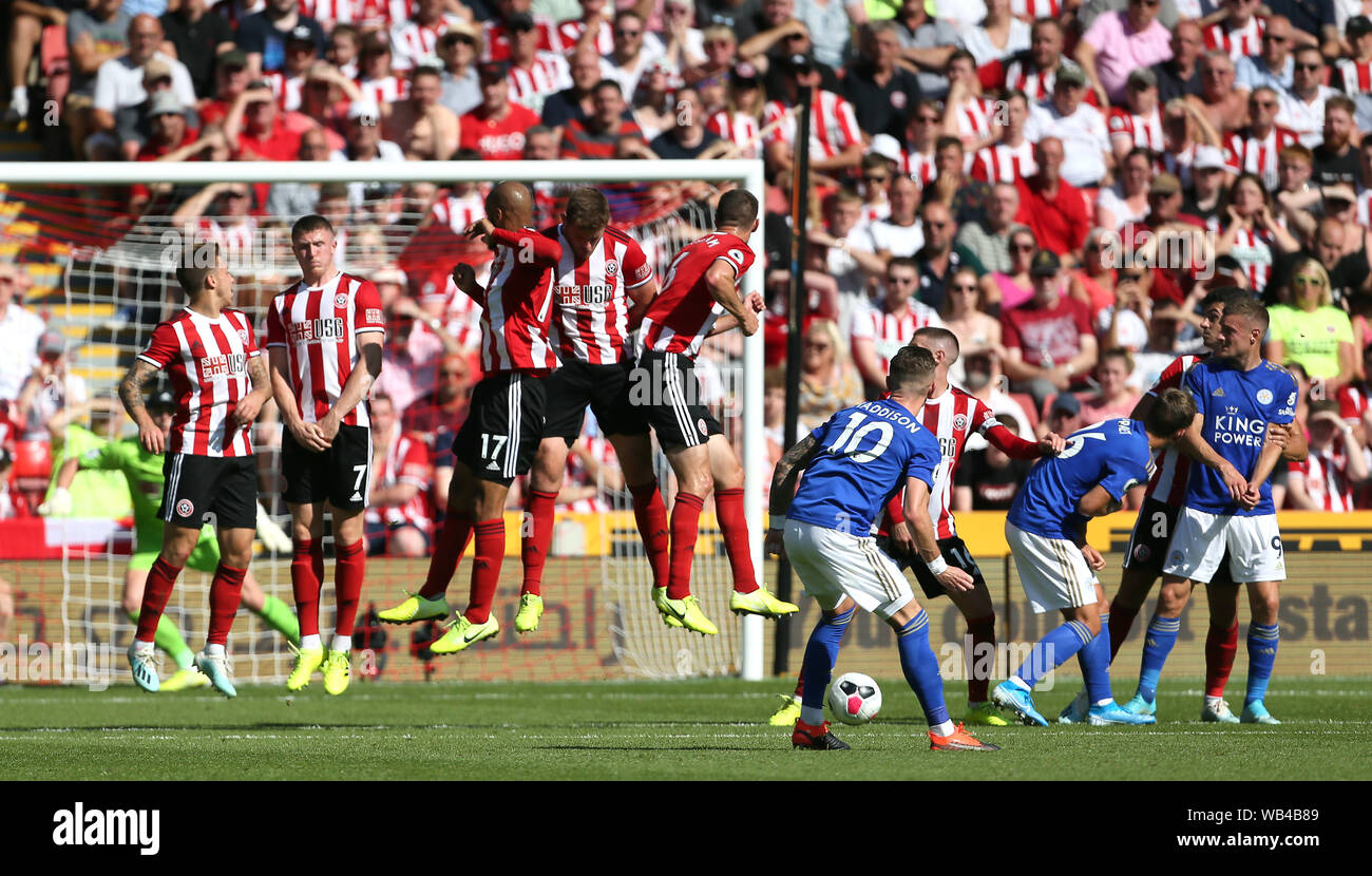 Leicester City's James Maddison (centre) takes a free kick during the
