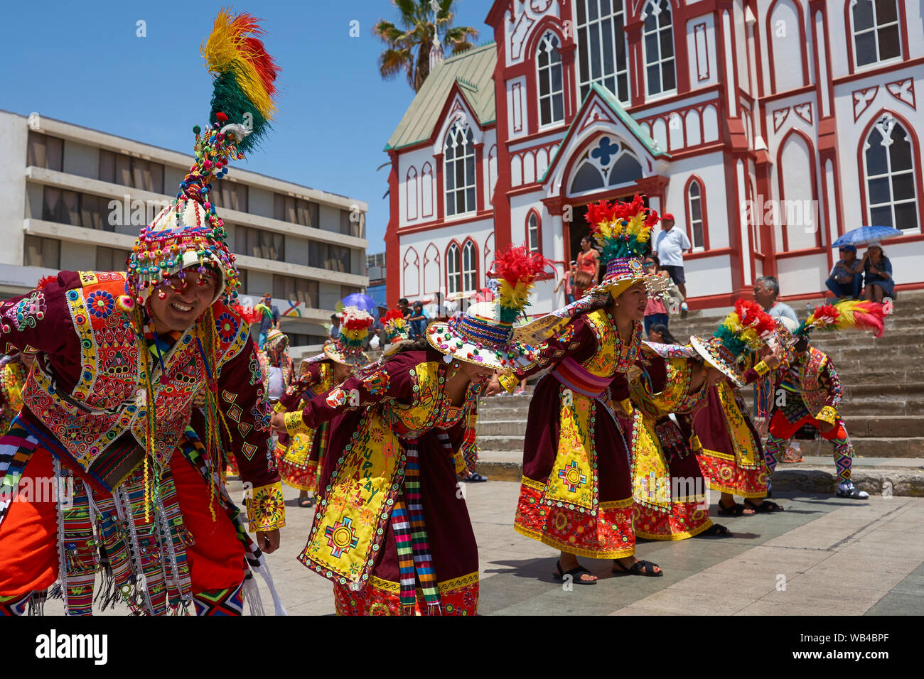 Men and women of the group Thinkus Rupay Masis, performing at the annual street carnival celebrating the strength of the sun. Stock Photo
