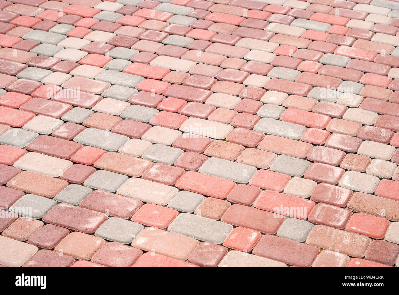 background - pavement of multicolored concrete pavers Stock Photo