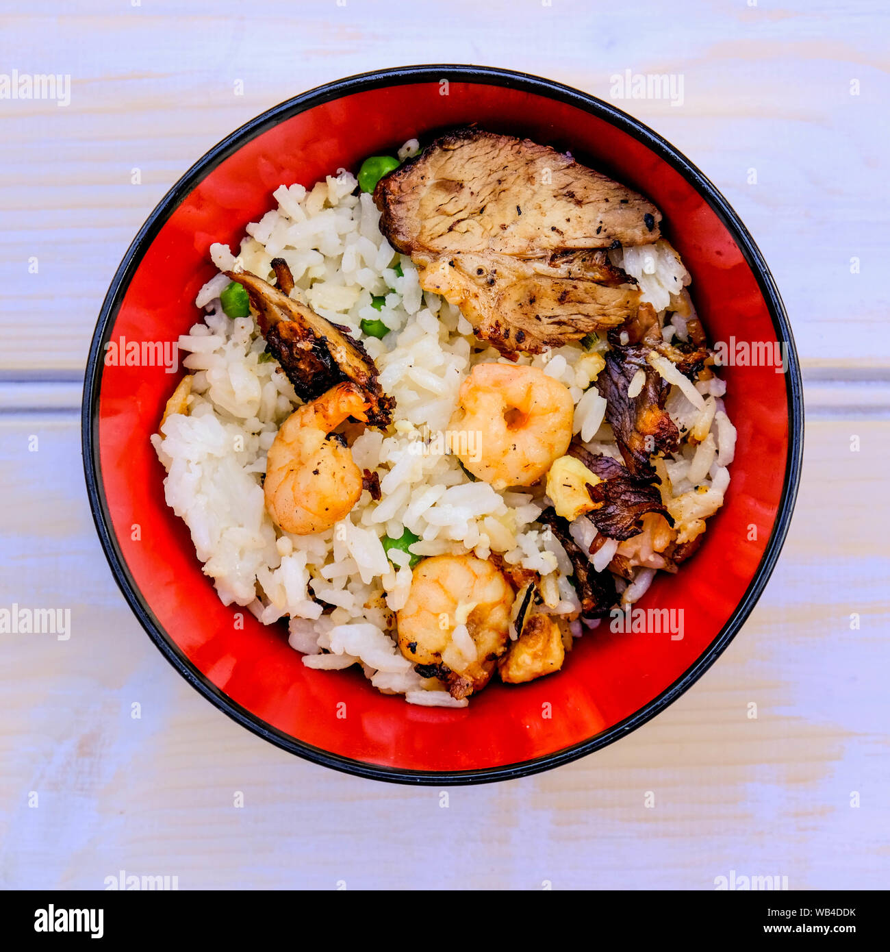 Chinese Style Egg Fried Rice With Pork and King or Tiger Prawns Stock Photo