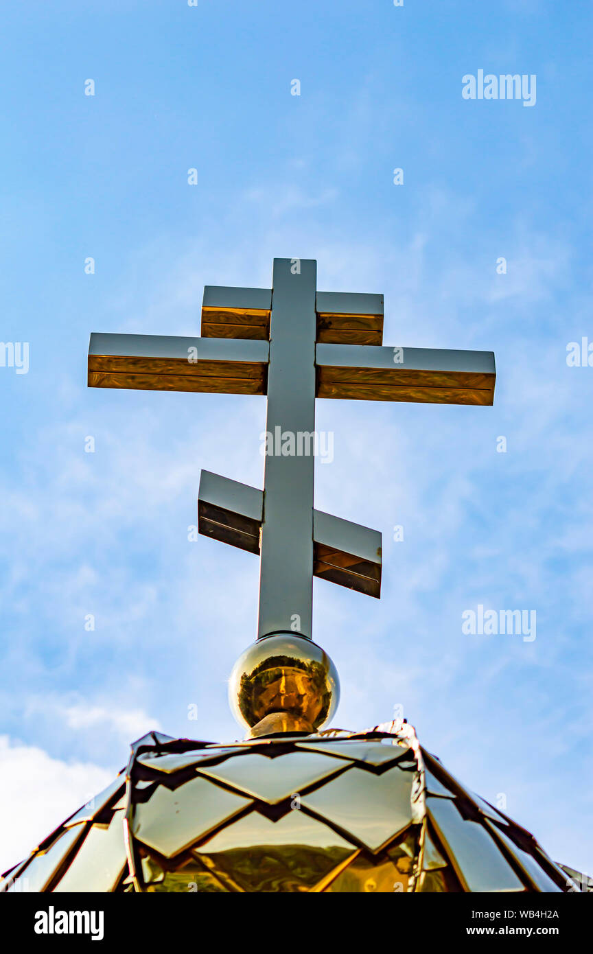 Golden domes with a cross of the Orthodox Church of Ukraine on a ...
