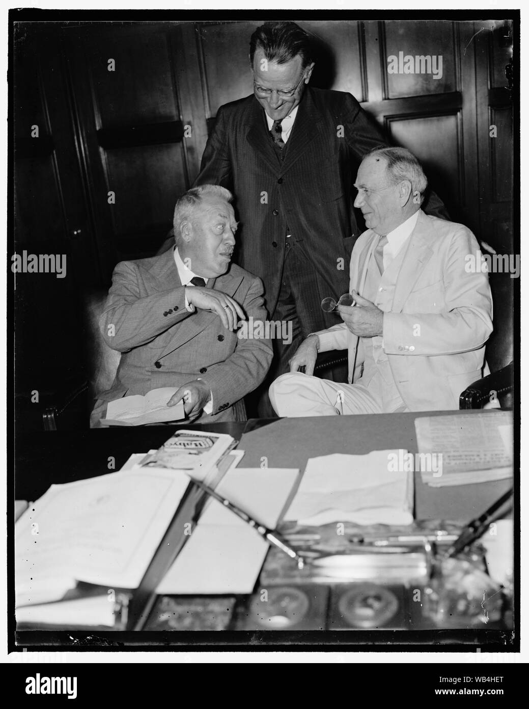 Eckener asks that helium gas be made available to Germany. Washington, D.C., May 25. A plan whereby American helium could be made available to Germany for commercial purposes was discussed today by Dr. Hugo Eckener, (left) German dirigible expert, with Secretary of Commerce Roper, (right) and Assistant Secretary Monroe Johnson. Roper told Eckner he felt sure that such a plan [...] be worked out, 5/25/37 Abstract/medium: 1 negative : glass ; 4 x 5 in. or smaller Stock Photo