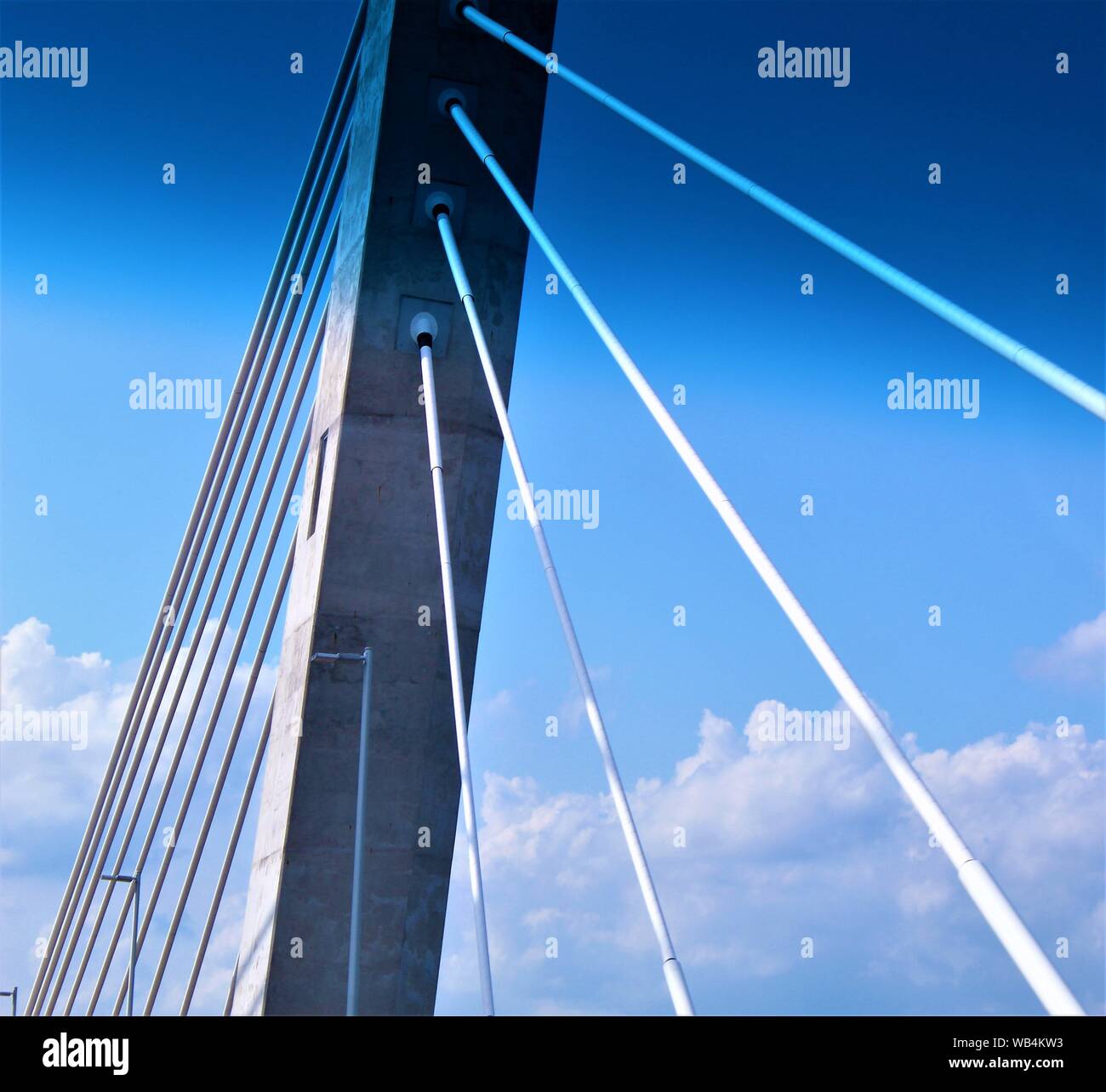 Close-up of the Goethals Bridge cable-stays against blue sky Stock Photo