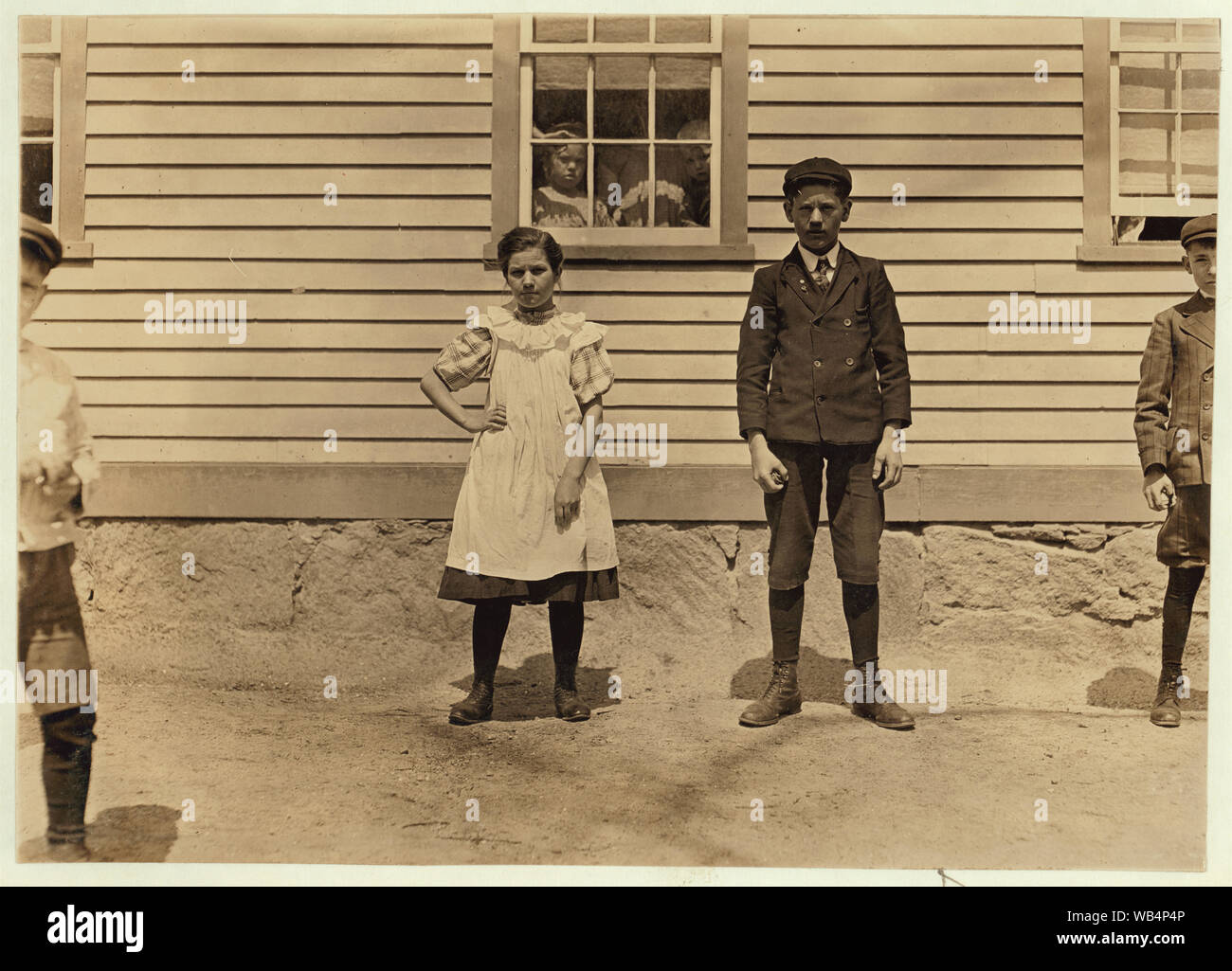 Edward St. Germain and sister Delia. She has been working in Phoenix (R.I.) Mill for 8 months. He works also. They cannot speak English. Abstract: Photographs from the records of the National Child Labor Committee (U.S.) Stock Photo