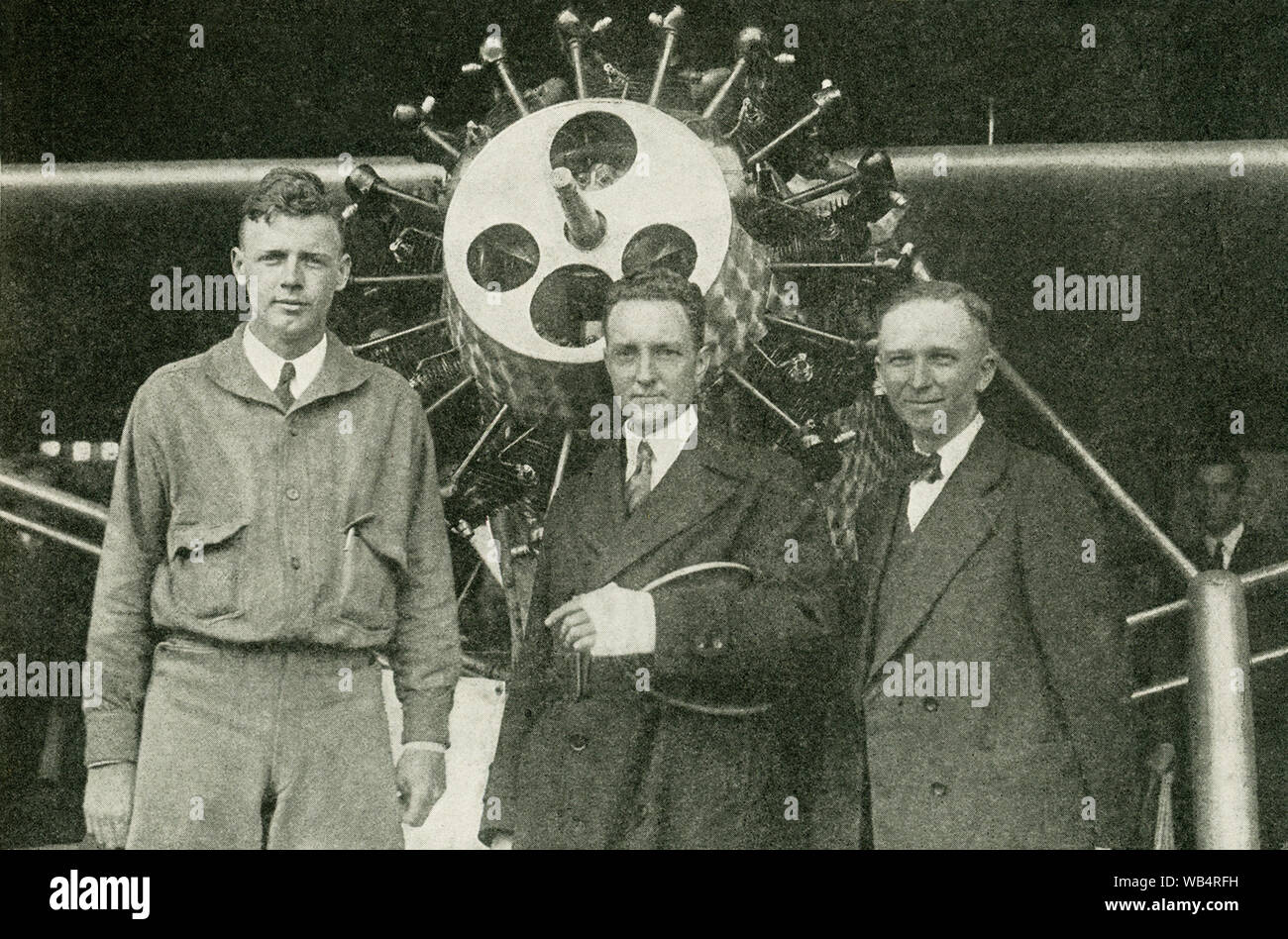 The caption reads:  Three Transatlantic Flyers. At the left is Colonel Charles A. Lindbergh, who was the first to fly from New York to Paris, May 20-21, 1927. In the center is Commander Richard E. Byrd, who was first to fly to the Pole, and who, with Bert Acosta, Bernt Balchen, and George O. Noville, flew from New York to France, June 29-30, 1927. At the right is Clarence  D. Chamberlain, who with Charles A Levine, flew from New York to Eisleben, Germany, June 4-6, 1927. Stock Photo
