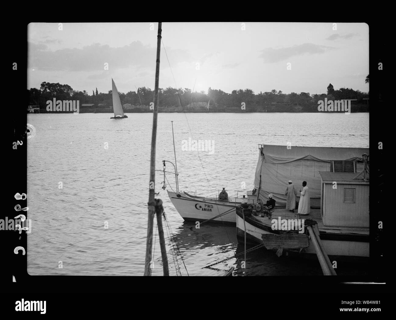 Egypt. River scenes. The Nile. Sunset scenes across the Nile Abstract/medium: G. Eric and Edith Matson Photograph Collection Stock Photo