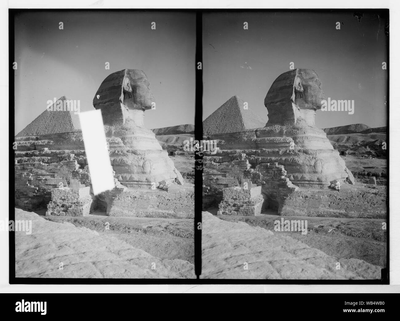 Egypt. Sphinx & pyramids. The Sphinx (profile) & pyramid Abstract/medium: G. Eric and Edith Matson Photograph Collection Stock Photo