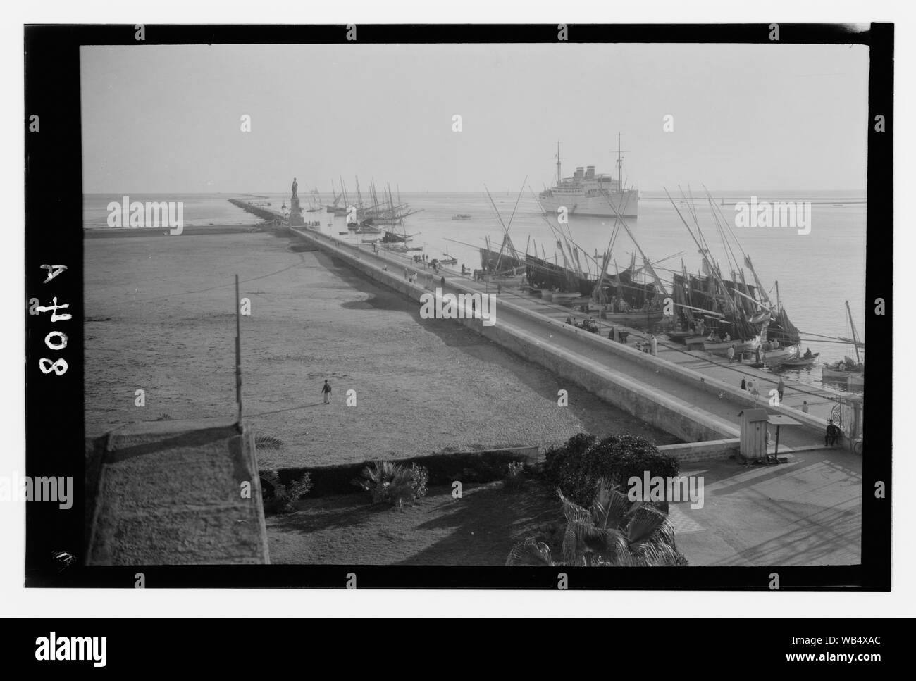 Egyptian views. Port Said. Port Said harbor and entrance of Suez Canal Abstract/medium: G. Eric and Edith Matson Photograph Collection Stock Photo
