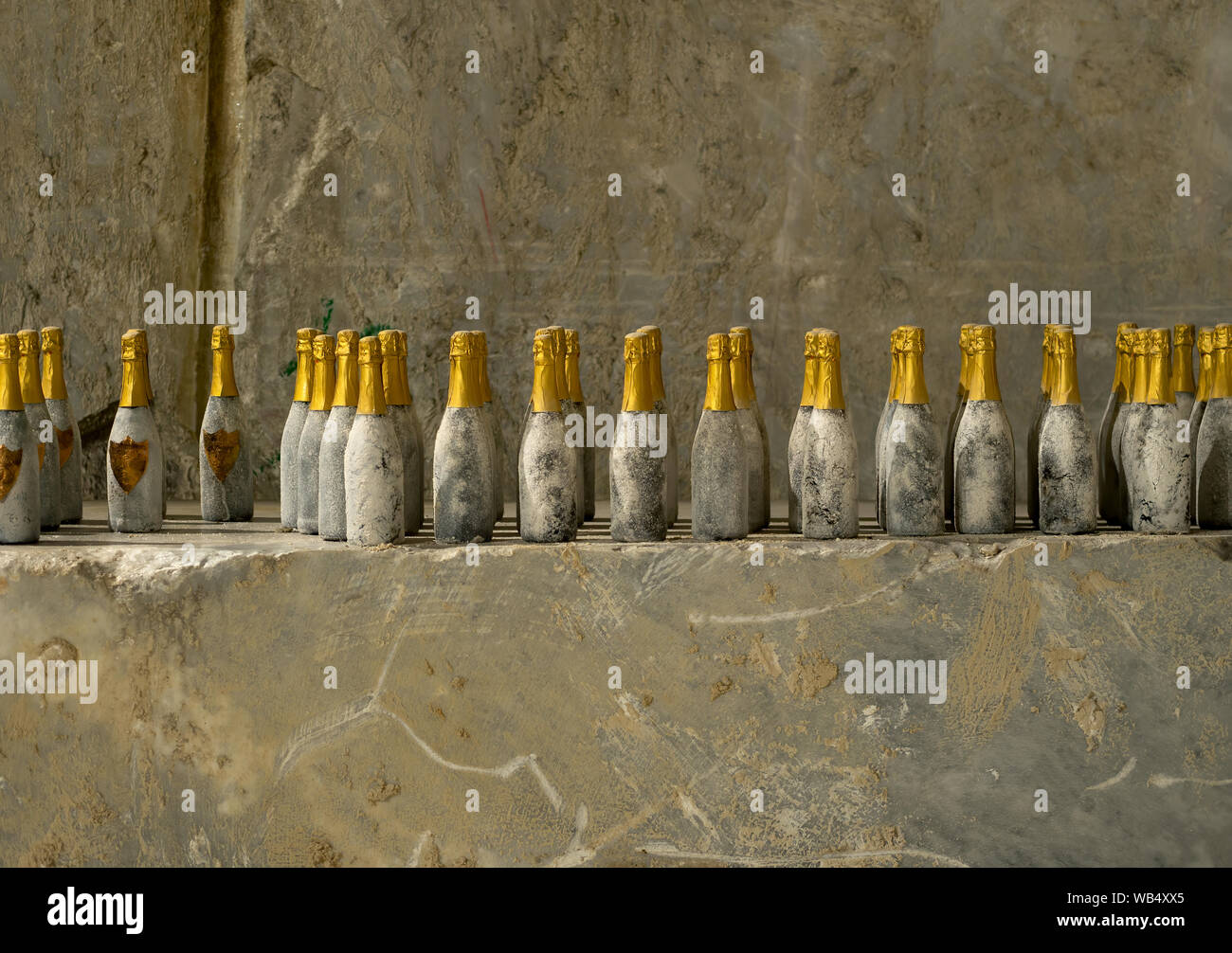 MASSA CARRARA, AUGUST 23, 2019 - lo straordinario sparkling wine, classic method inside the quarry at Fantiscritti. Grapes from the Apuan hills. Stock Photo
