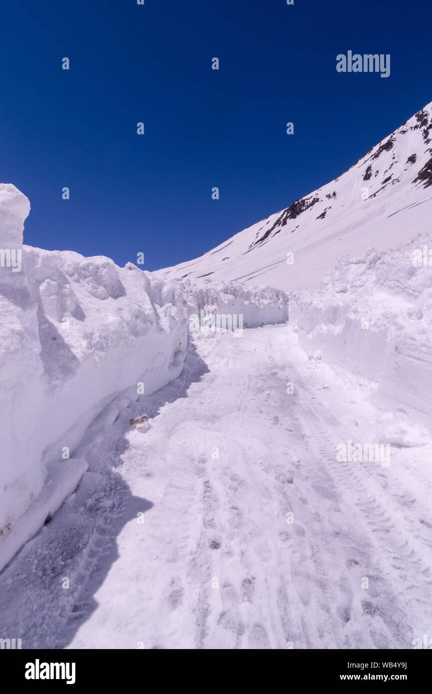 Baralacha Pass - Snow Covered Road in Ladakh - Stock Photo