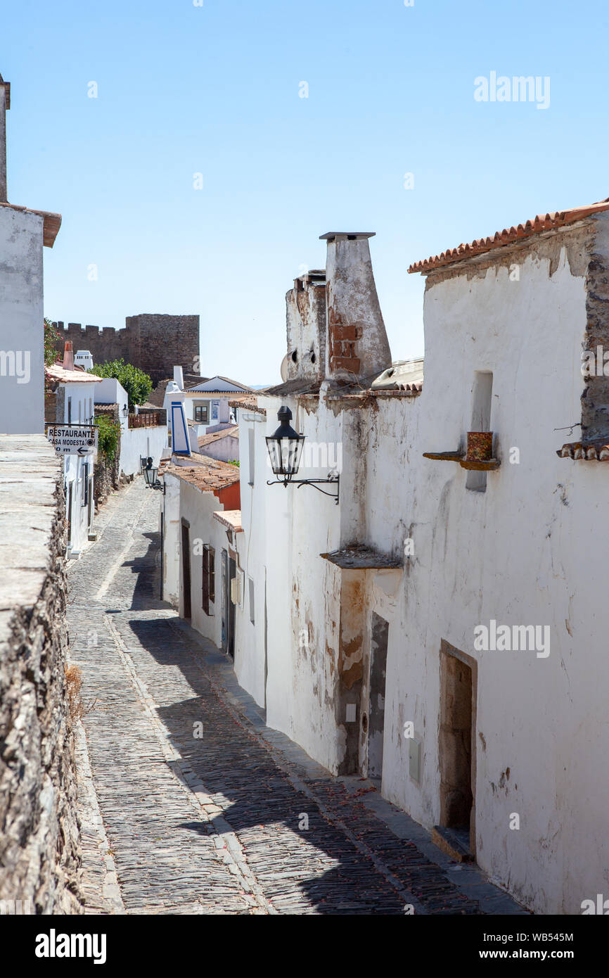 A street leading to the medieval castle in the hilltop village of Monsaraz in the region of Alentejo, Portugal. Stock Photo