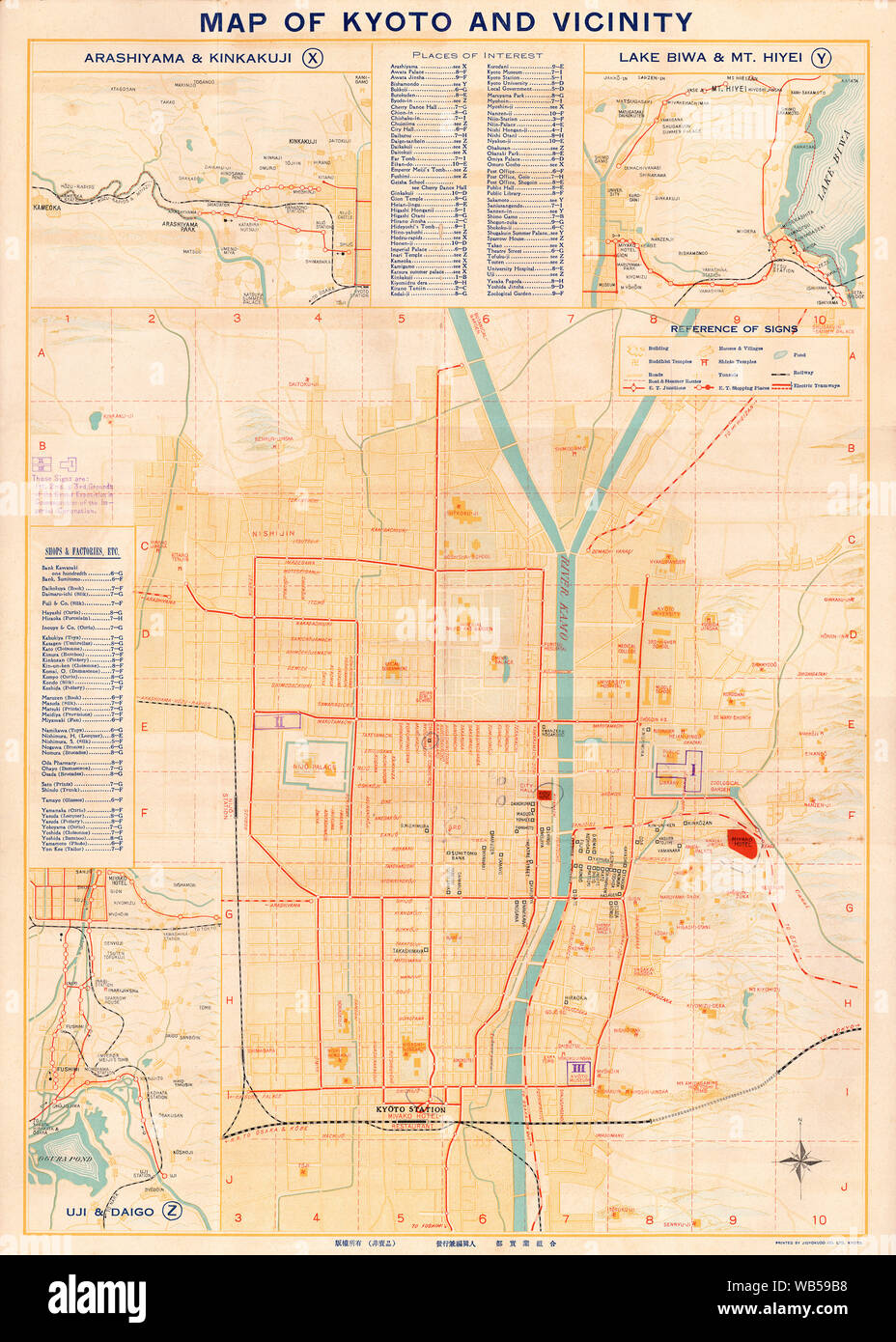 [ 1920s Japan - Map of Kyoto, 1928 ] —   'Map of Kyoto and Vicinity with Shopping Directory.' English language map, published by the Miyako Hotel. Features references for shops, factories and tourist sites. Inset maps for Arashiyama, Lake Biwa, Mt. Hiei, Uji and Daigo. The map is not dated but contains markings for the 'Grand Exposition in Commemoration of the Imperial Coronation,' which dates it to 1928 (Showa 3) when an exhibition for the coronation of Emperor Showa (Hirohito) took place.  20th century vintage map. Stock Photo