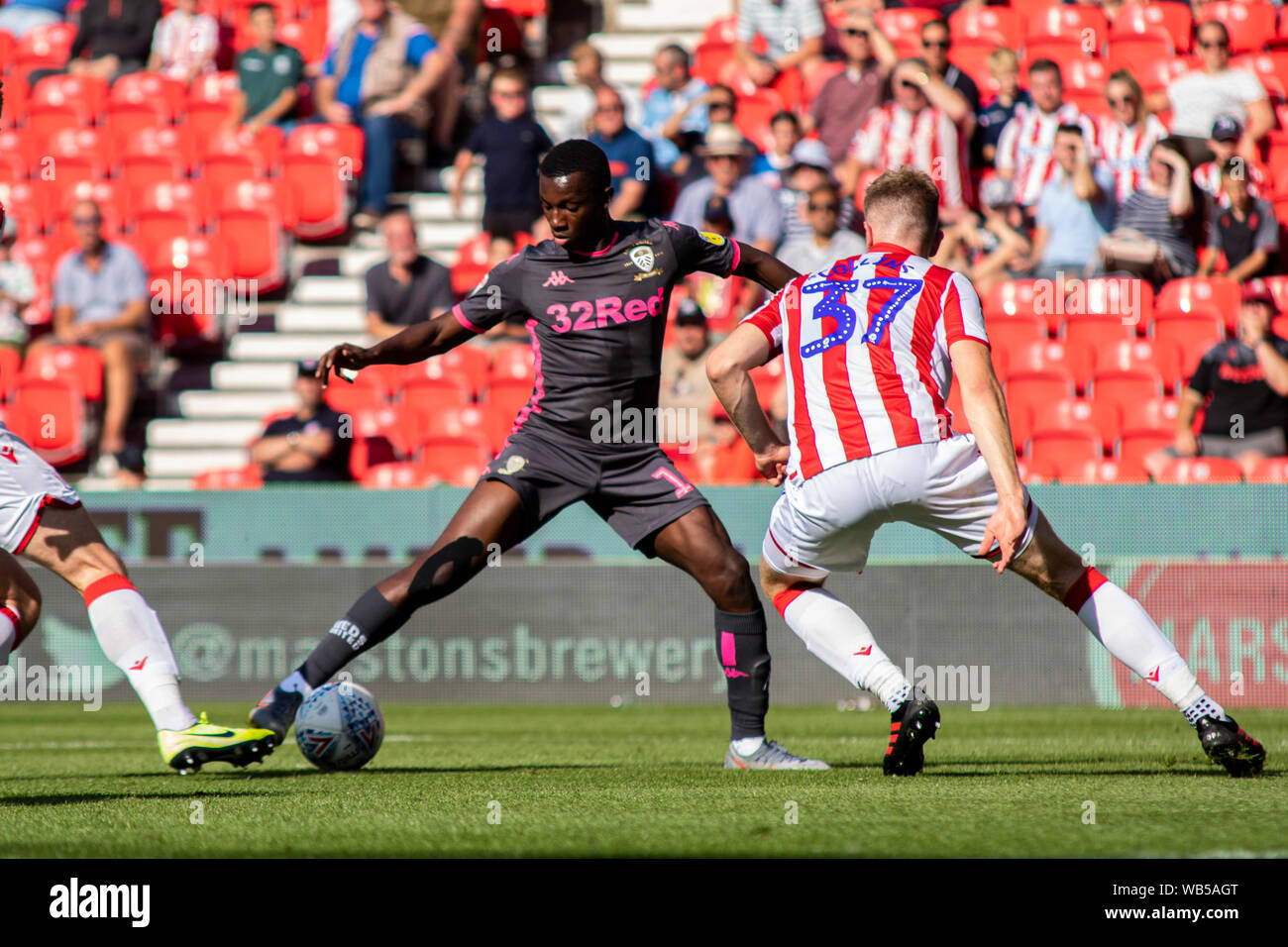 Stoke On Trent, UK. 24th Aug, 2019. Eddie Nketiah of Leeds United (l) in action against Stoke City. EFL Skybet championship match, Stoke City v Leeds United at the Bet365 stadium in Stoke on Trent on Saturday 24th August 2019. this image may only be used for Editorial purposes. Editorial use only, license required for commercial use. No use in betting, games or a single club/league/player publications. pic by Lewis Mitchell/Andrew Orchard sports photography/Alamy Live news Credit: Andrew Orchard sports photography/Alamy Live News Stock Photo