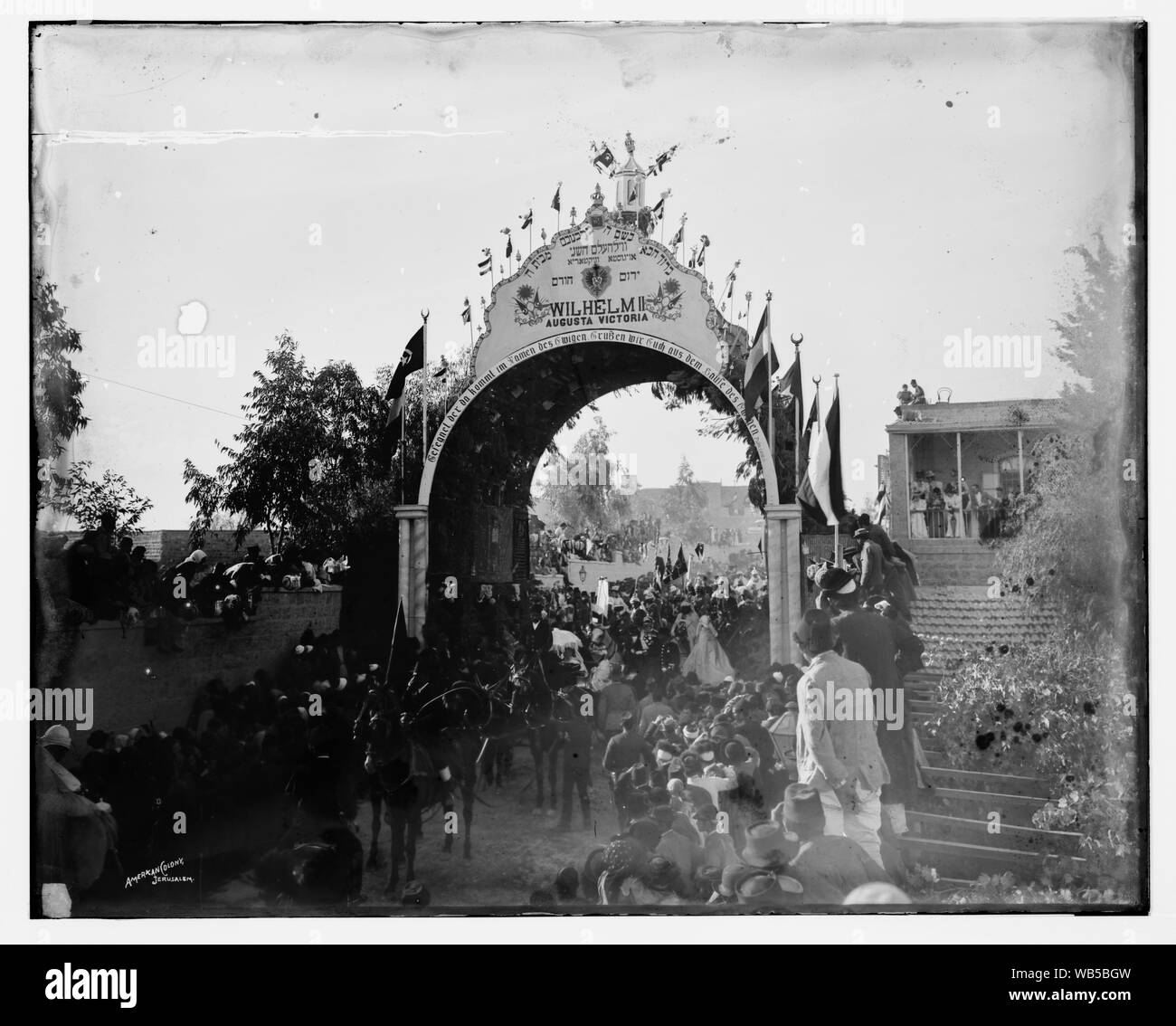 Emperor passing through the arch erected by the Jewish community of Jerusalem Abstract/medium: G. Eric and Edith Matson Photograph Collection Stock Photo