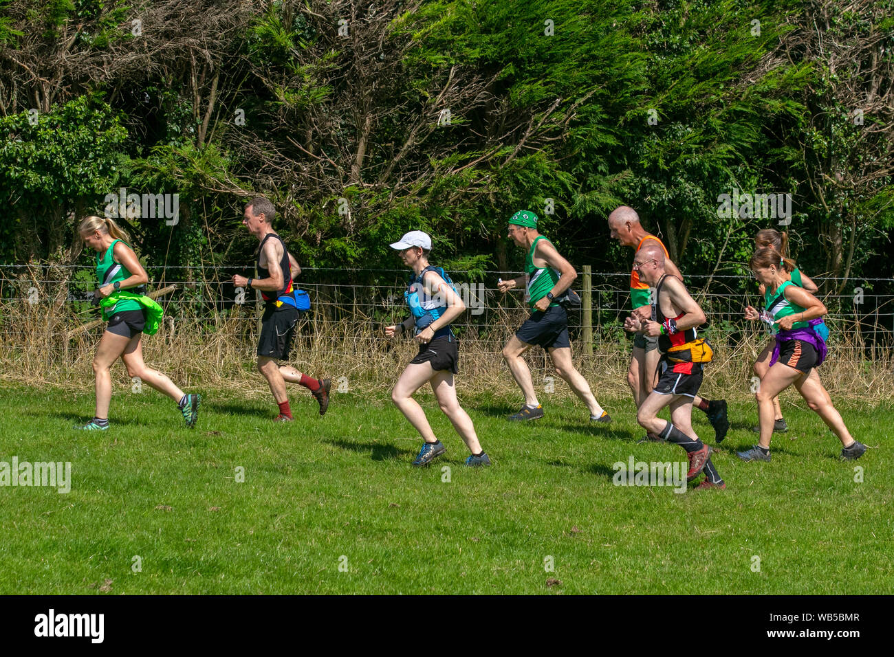 Cross country running in Chipping, Lancashire.  UK Weather. UK Weather.; Hot summer day in central Lancashire for Chipping agricultural show. This is a 7.5 miles category BM fell race, which, even though it takes place in summer, it is not an easy race and is not ideal for beginners to fell running. Credit: MWI/AlamyLiveNews Stock Photo