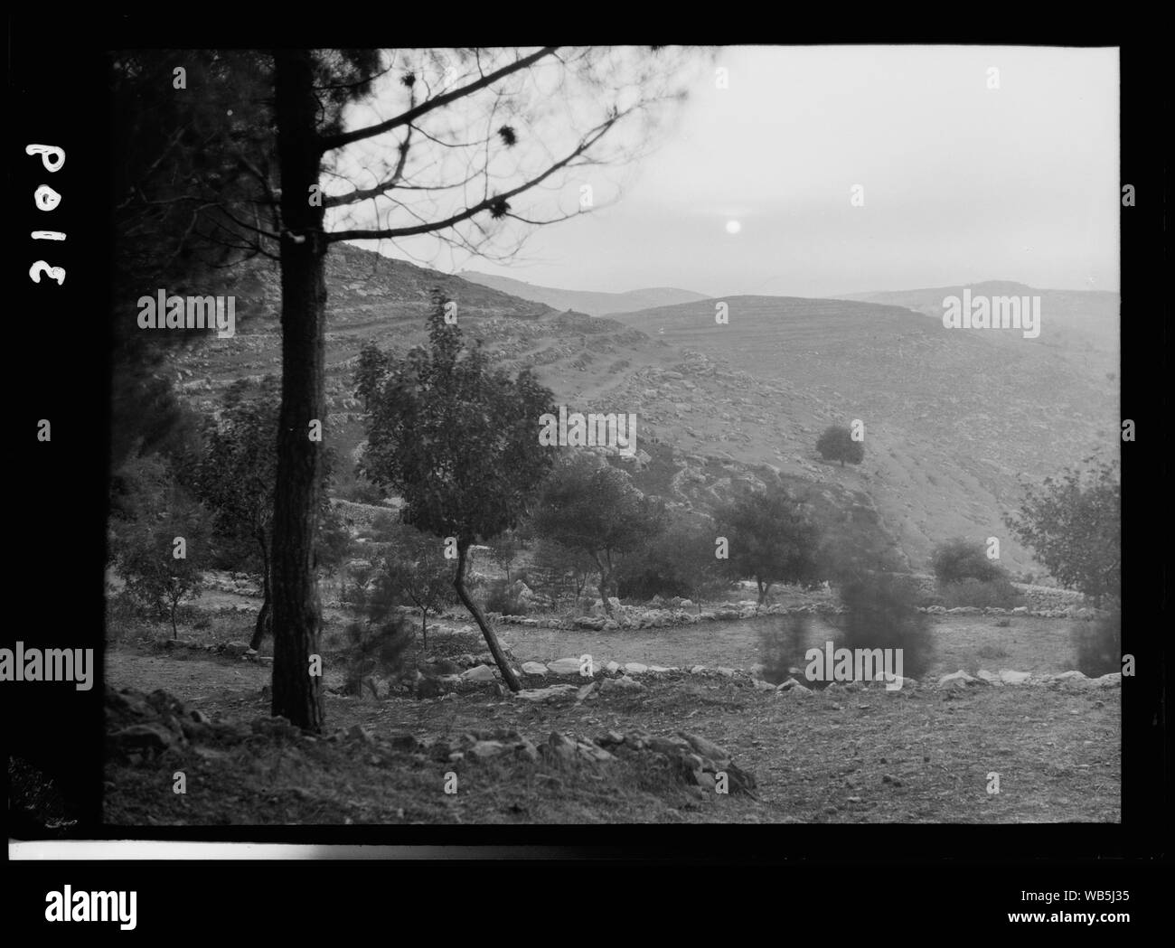 Environs of Jerusalem. El Kubeibeh. The setting sun. Suggestive of The day is far spent Abstract/medium: G. Eric and Edith Matson Photograph Collection Stock Photo