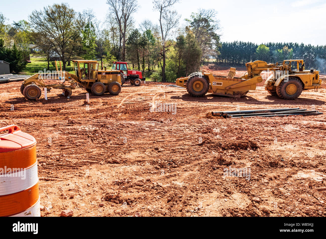 HICKORY, NC, USA-12 APRIL 2019: Earth--moving machinery prepares building site for apartment complex. Stock Photo