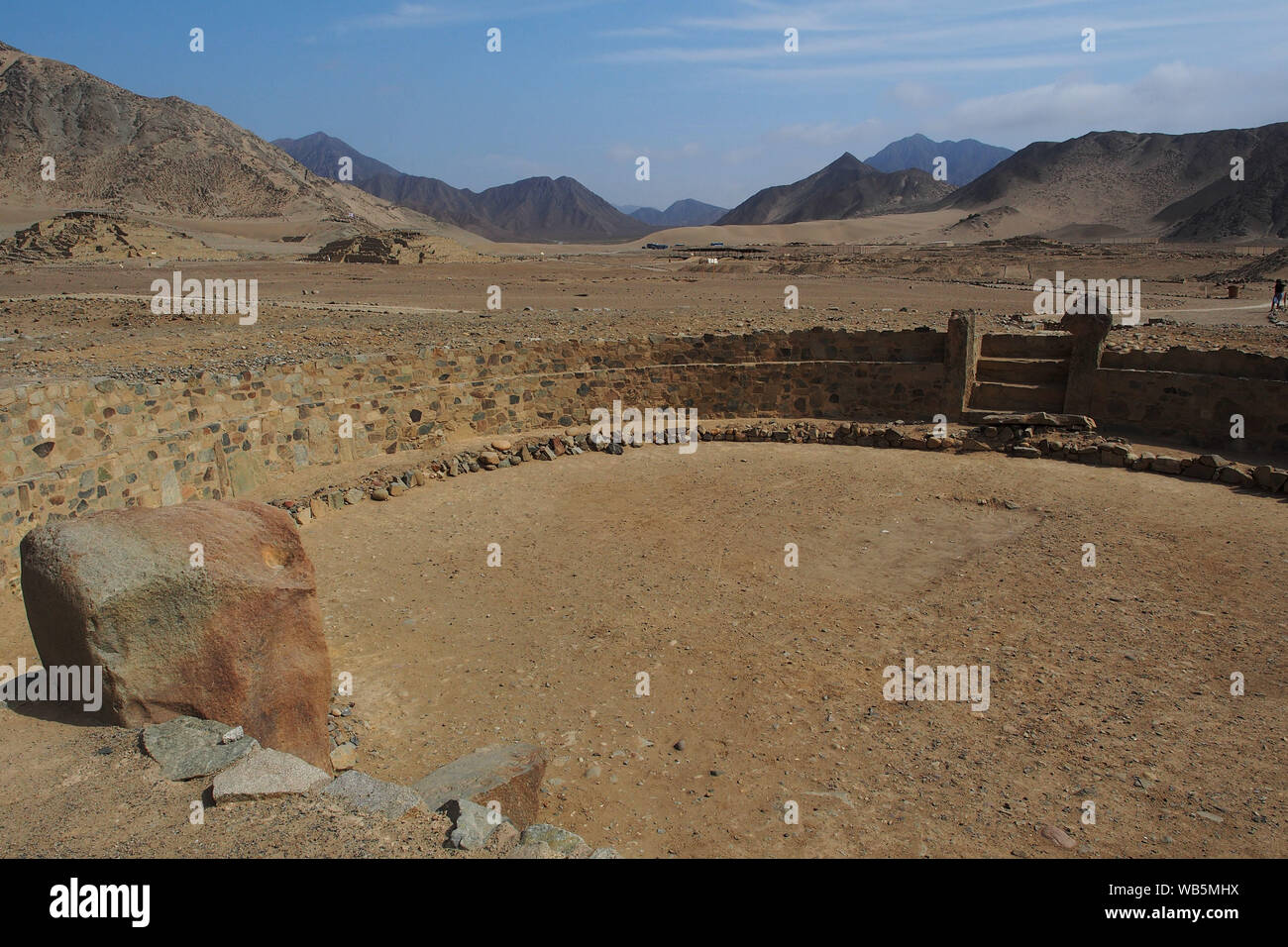 View of a circular plaza of the ancient sacred citadel of Caral. The sacred city of Caral is considered as the oldest civilization in America, its remains date from 3,500 BC. Stock Photo