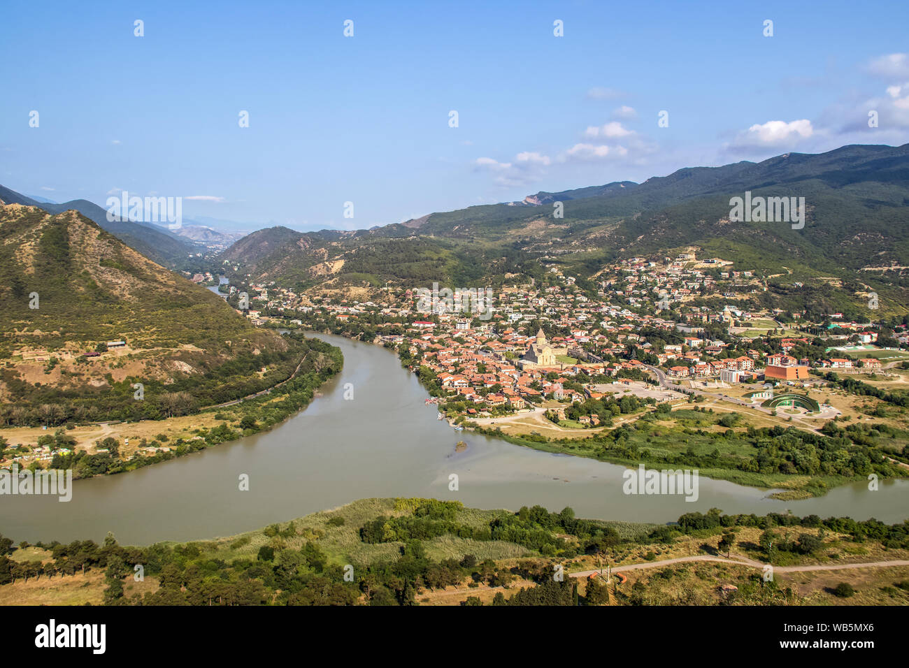 Confluence of the Mtkvari and Aragvi rivers viewed from above at Mtskheta - one of the oldest cities in Georgia - and view of the Svetitskhoveli Cathe Stock Photo