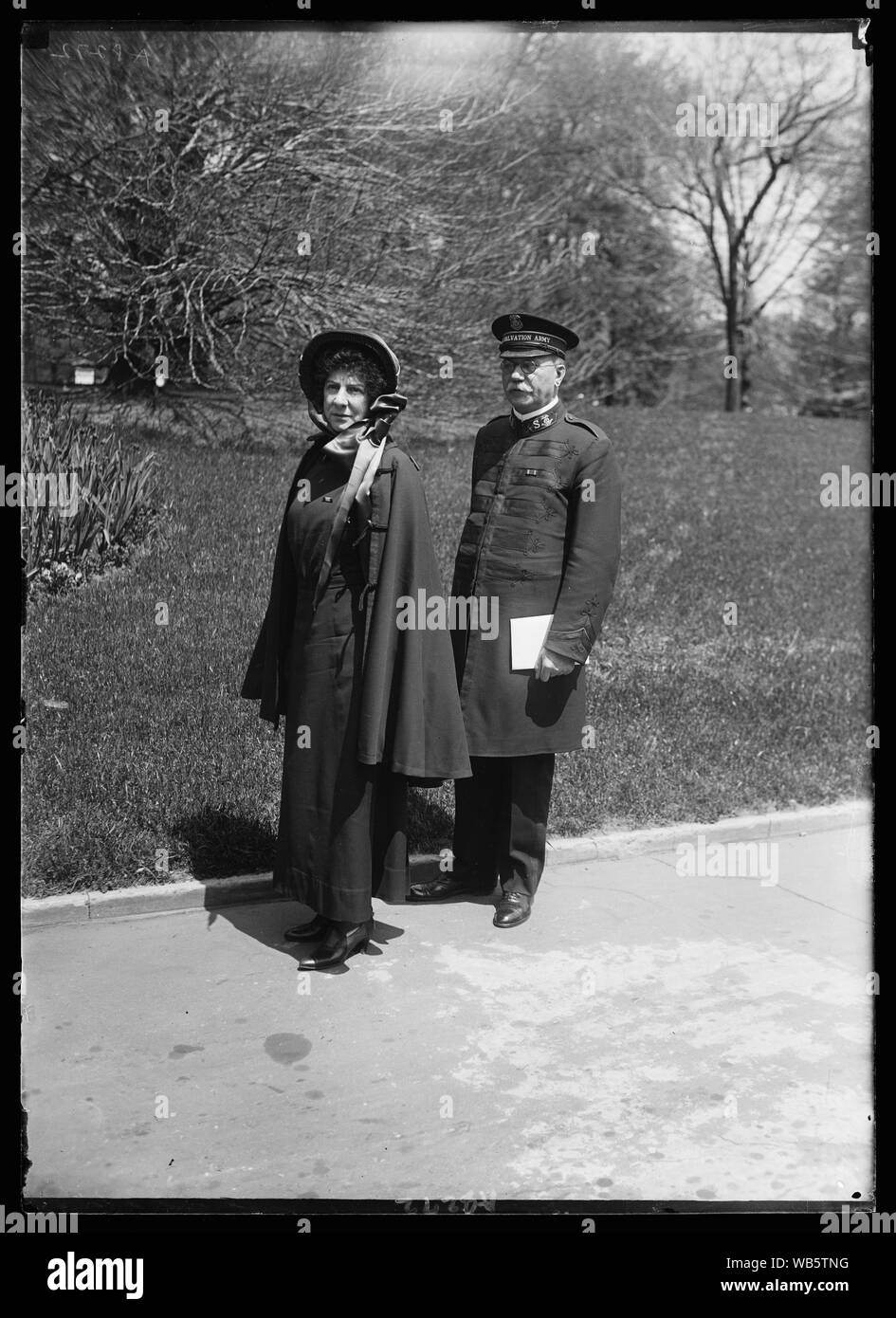 Evangeline Booth, Commander of the Salvation Army in the U.S., snapped at the White House, April 26th, with Col. Richard E. Holz, Chief Sec. of the Army Abstract/medium: 1 negative : glass ; 5 x 7 in. or smaller Stock Photo