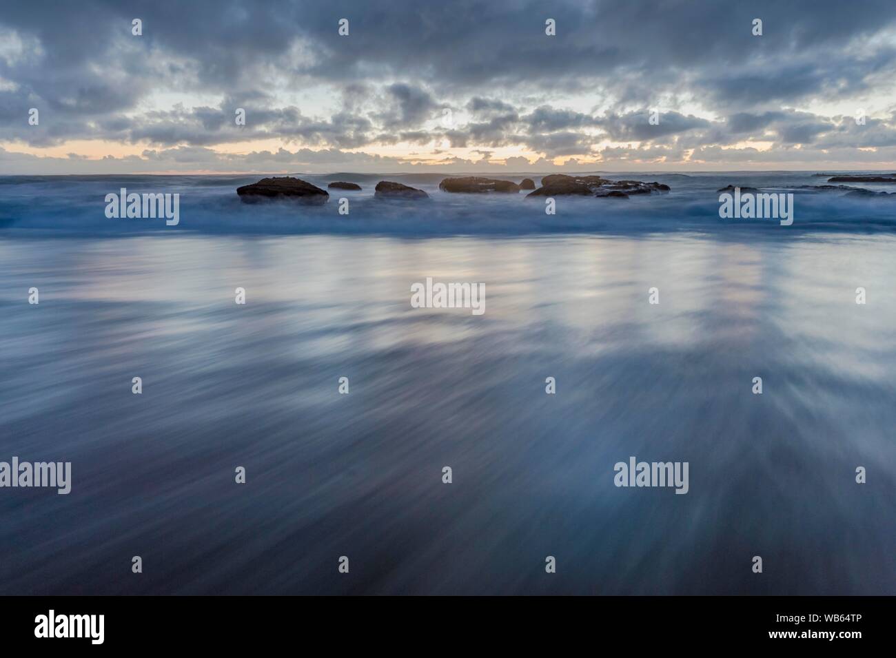 Ebb tide on the beach of Opononi, Far District, North Island New
