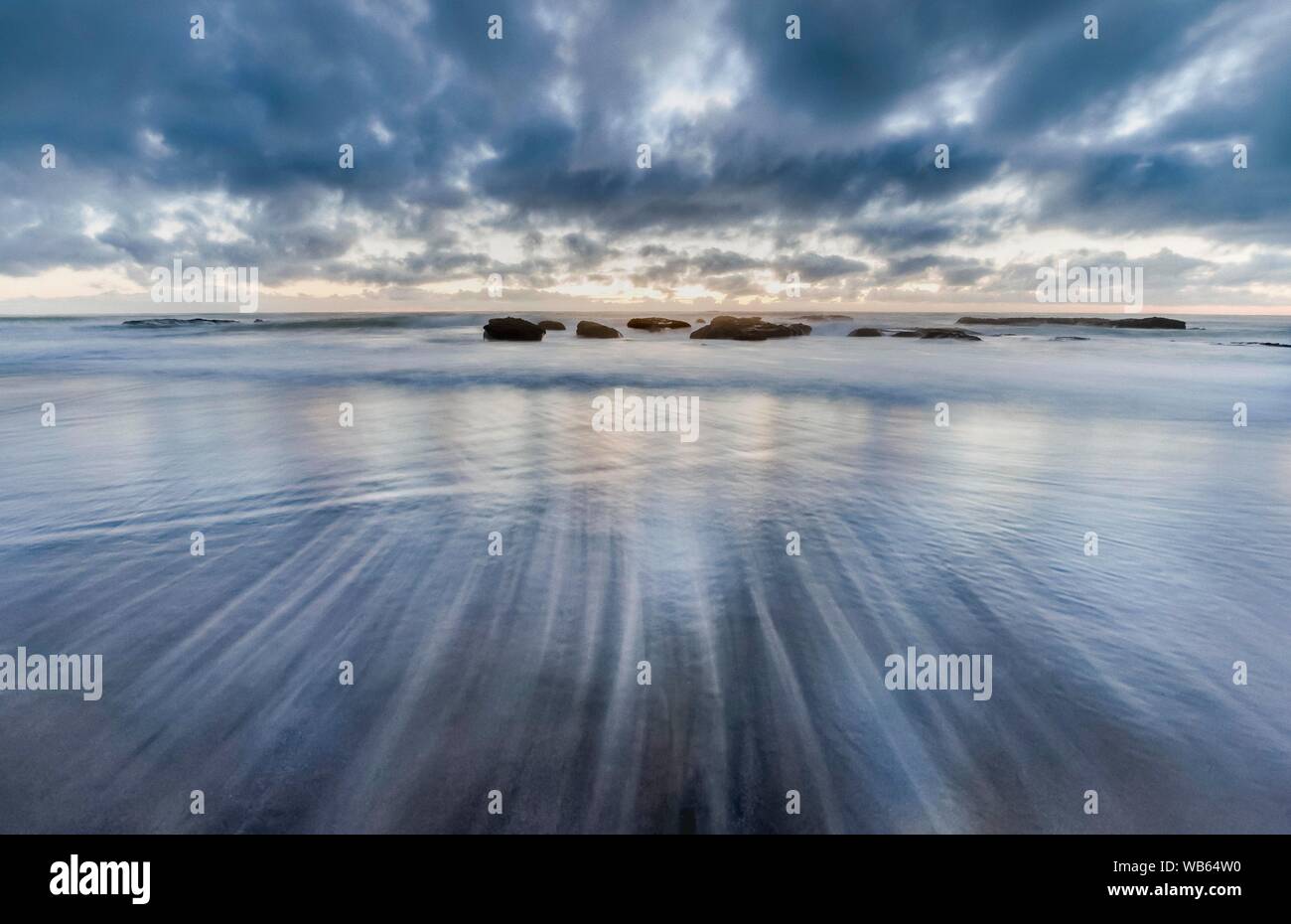 Ebb tide on the beach of Opononi, Far District, North Island New