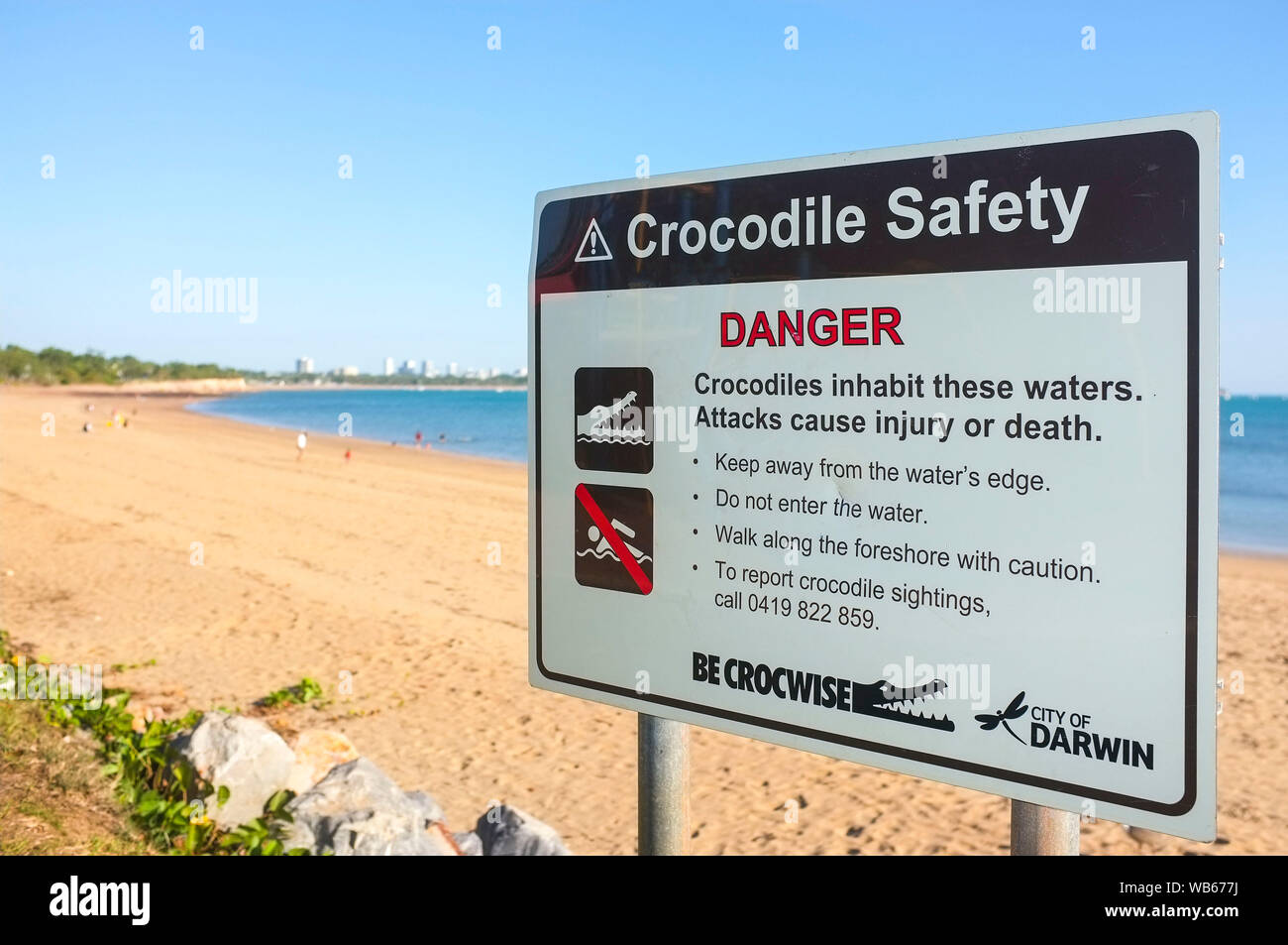 Crocodile warning sign on the beach of East Point in Darwin city, Northern Territory, Australia. Stock Photo