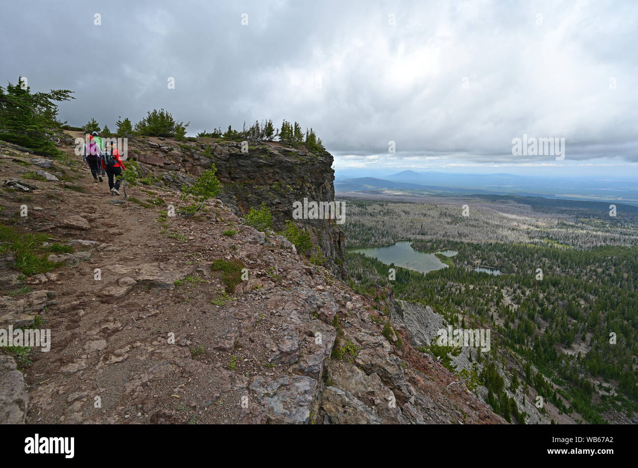 Hikers on the Tam McArthur Rim Trail in the Three Sisters vWilderness near Sisters, Oregon. Stock Photo