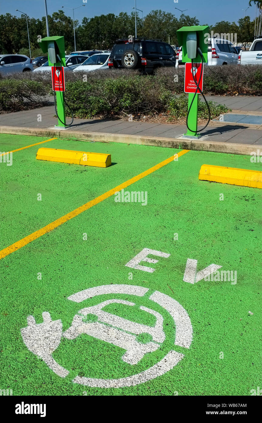Tesla electric vehicle chargers at the Darwin International Airport in Darwin, Northern Territory Australia. Stock Photo