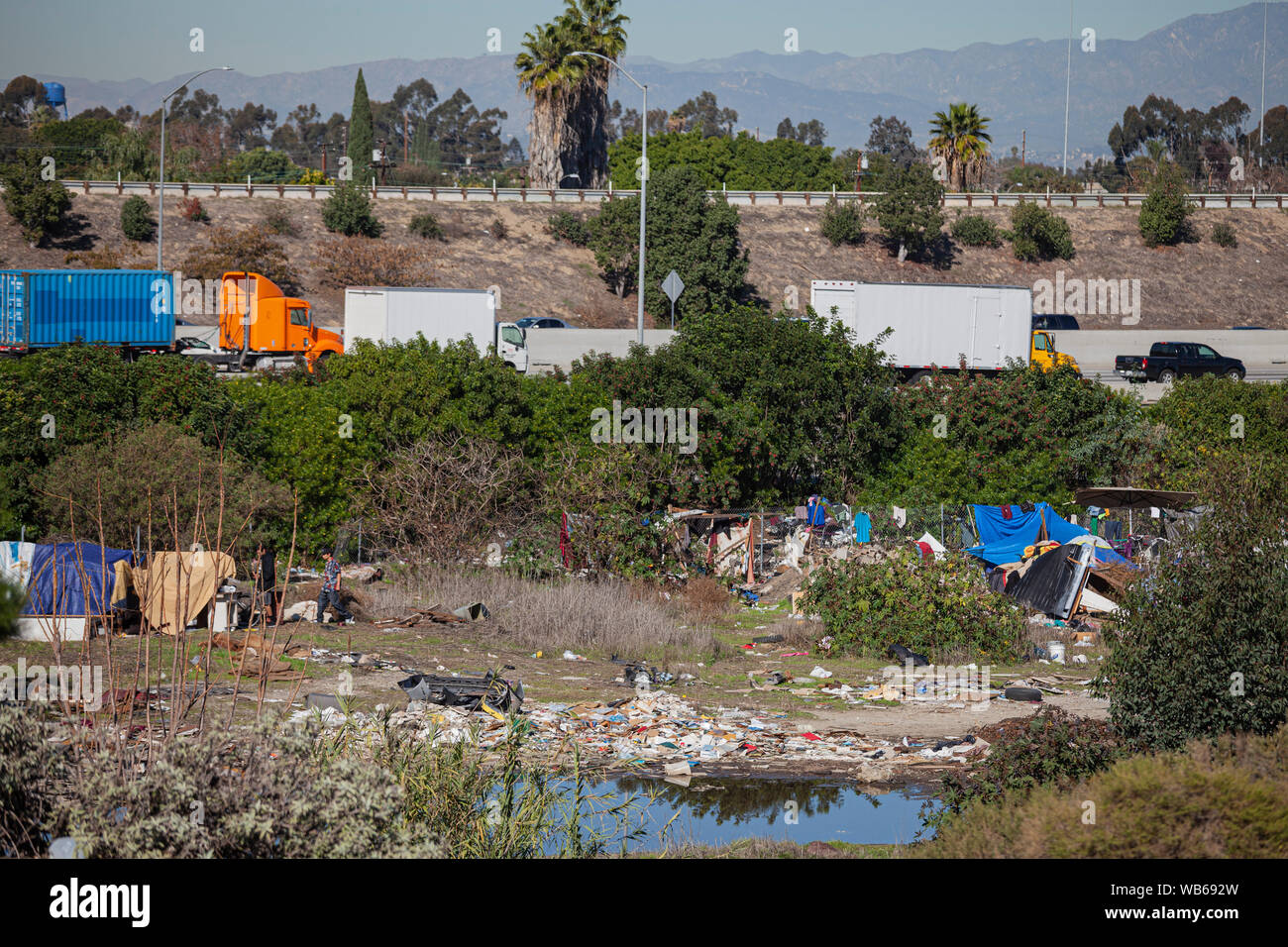Homeless camp along the Los Angeles River, City of Paramount, South LA, Califortnia, USA, Stock Photo