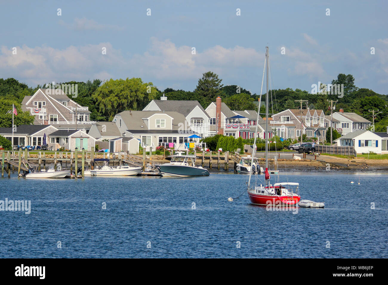 A view of boats and waterfront homes from Lewis Bay, Hyannis, Cape Cod, Massachusetts, United States Stock Photo