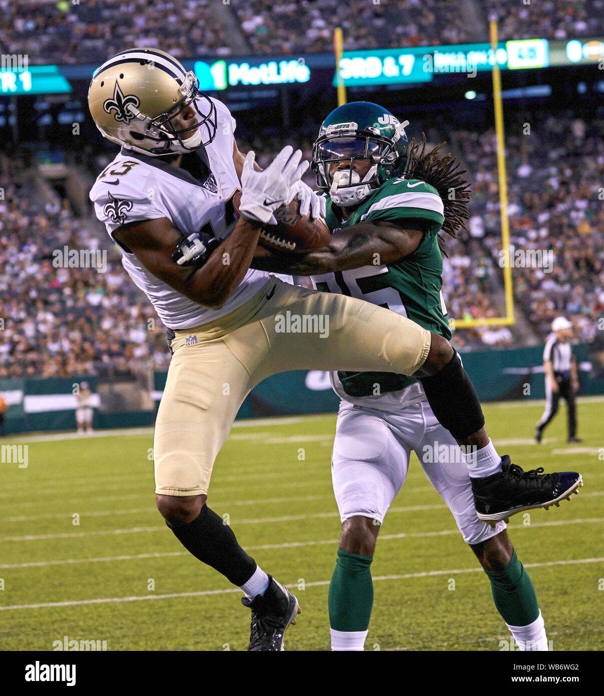 East Rutherford, New Jersey, USA. 24th August, 2019. : New Orleans Saints  wide receiver Michael Thomas (13) catches a touchdown pass over New York  Jets cornerback Alex Brown (25) during a preseason