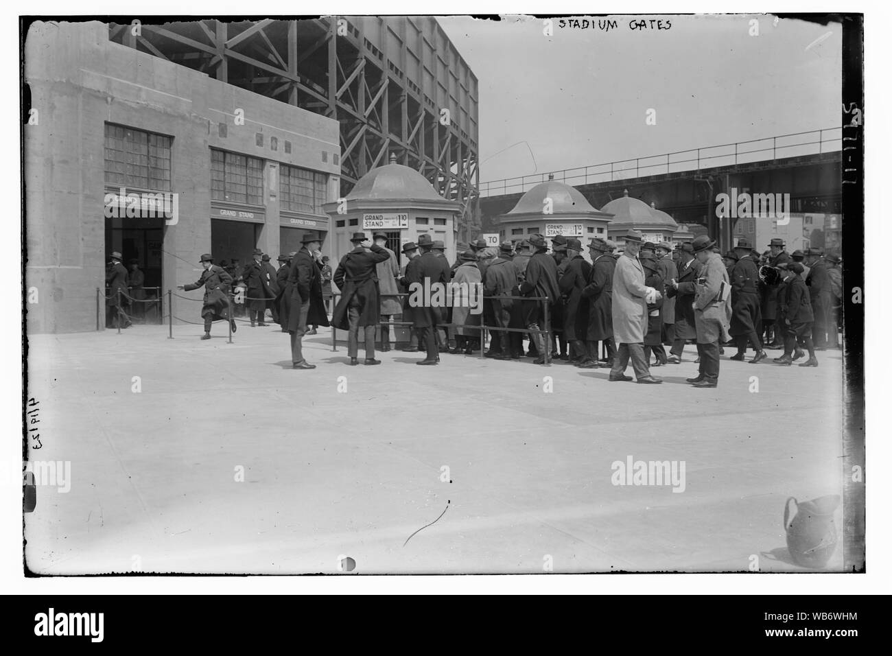 Fans at ticket booths at Yankee Stadium, right field grandstand (baseball) Abstract/medium: 1 negative : glass ; 5 x 7 in. or smaller. Stock Photo