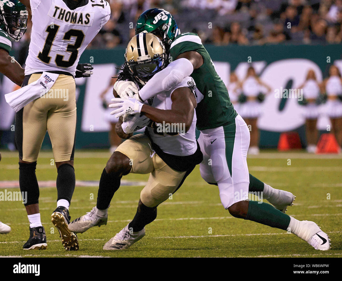 East Rutherford, New Jersey, USA. 24th August, 2019. : New Orleans Saints  running back Alvin Kamara (41) is tackled by New York Jets linebacker  Neville Hewitt (46) during a preseason game between