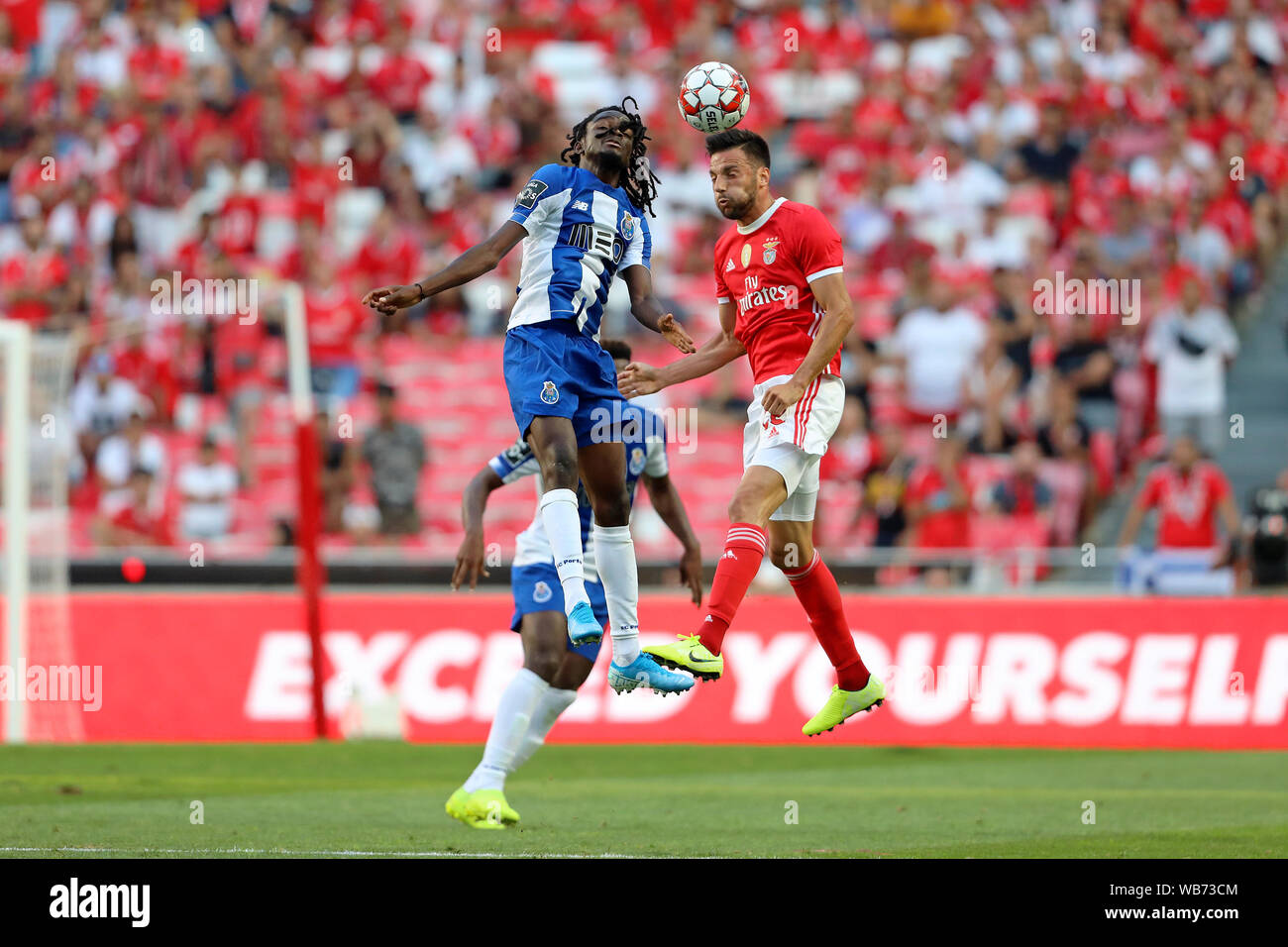 Romário Baró of FC Porto (L) and Andreas Samaris of SL Benfica (R) are seen  in action during the League NOS 2019/20 football match between SL Benfica  and FC Porto in Lisbon.(Final