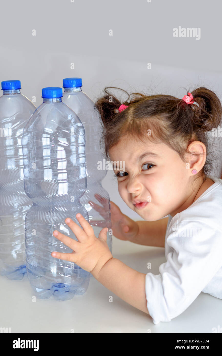 Funny little child doing disgust face because aversion reaction on