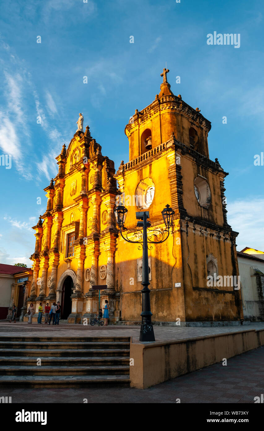 The 'Iglesia de la recoleccion' Catholic Church facade illuminated by the last sun rays at sunset in Leon, Nicaragua. Stock Photo
