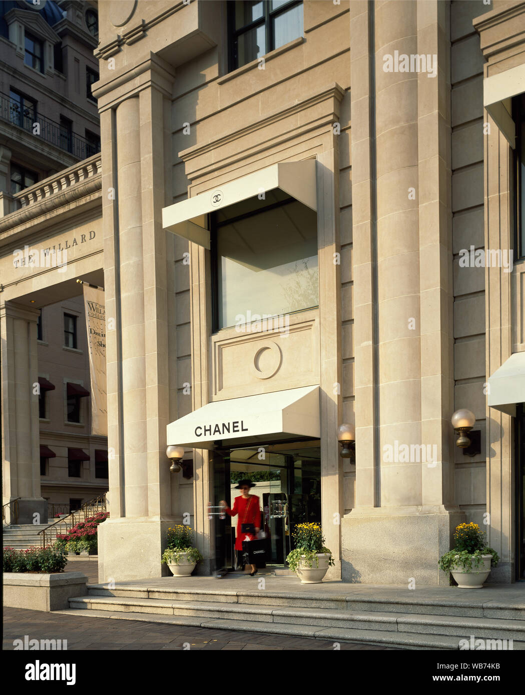 Female shopper comes out of Chanel perfume store that was located next to  the Willard Hotel, Washington, D.C, during the 1980s Stock Photo - Alamy