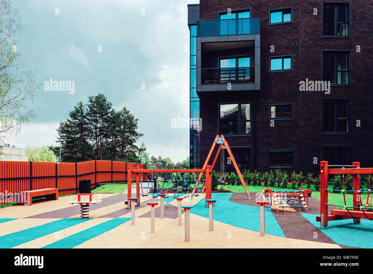 Children playground at European modern complex of apartment residential ...