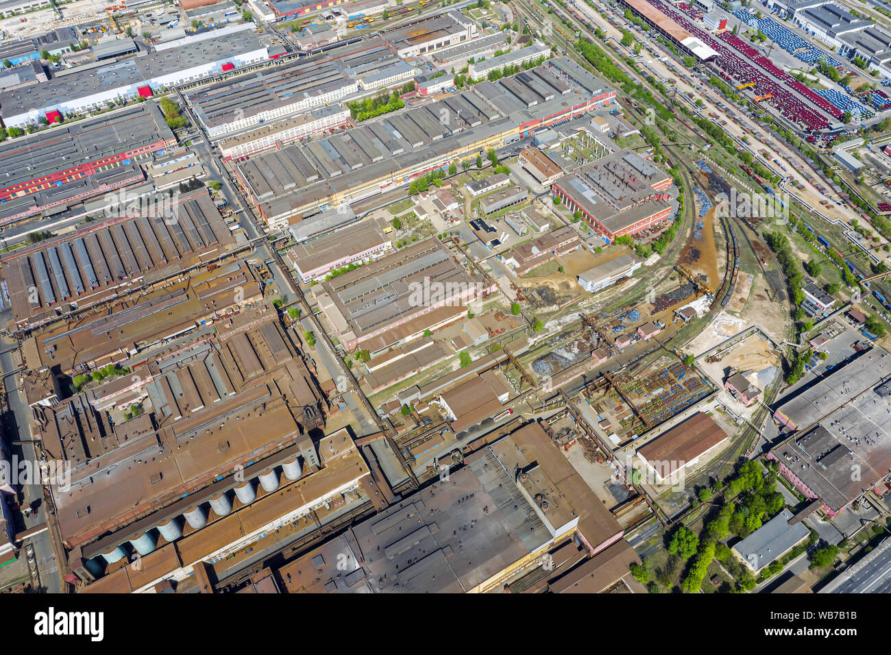 bird eye view of suburb industrial zone with lots of industrial buildings and manufacturing companies Stock Photo