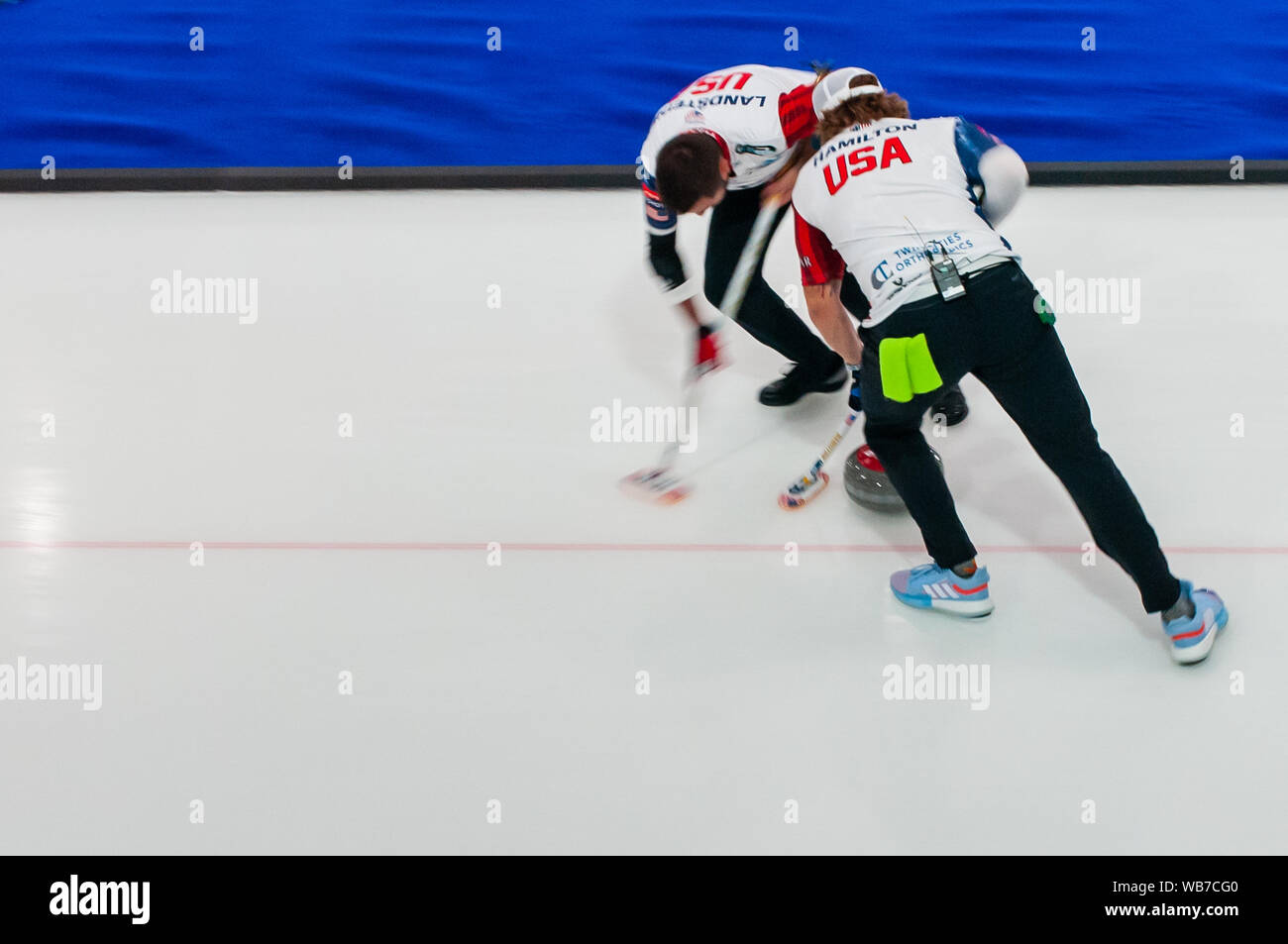 Raleigh, North Carolina, USA. 24th Aug, 2019. Aug. 24, 2019 Ã RALEIGH, N.C., US - JOHN LANDSTEINER and MATT HAMILTON of the United States in action during Curling Night in America at the Raleigh Ice Plex. Curling Night in America featured members of the U.S. Olympic menÃs gold medal team from the 2018 Winter Olympics in South Korea, the U.S. womenÃs team, as well as teams from Italy, Japan, and Scotland, Aug. 22-24, 2019. Credit: Timothy L. Hale/ZUMA Wire/Alamy Live News Stock Photo