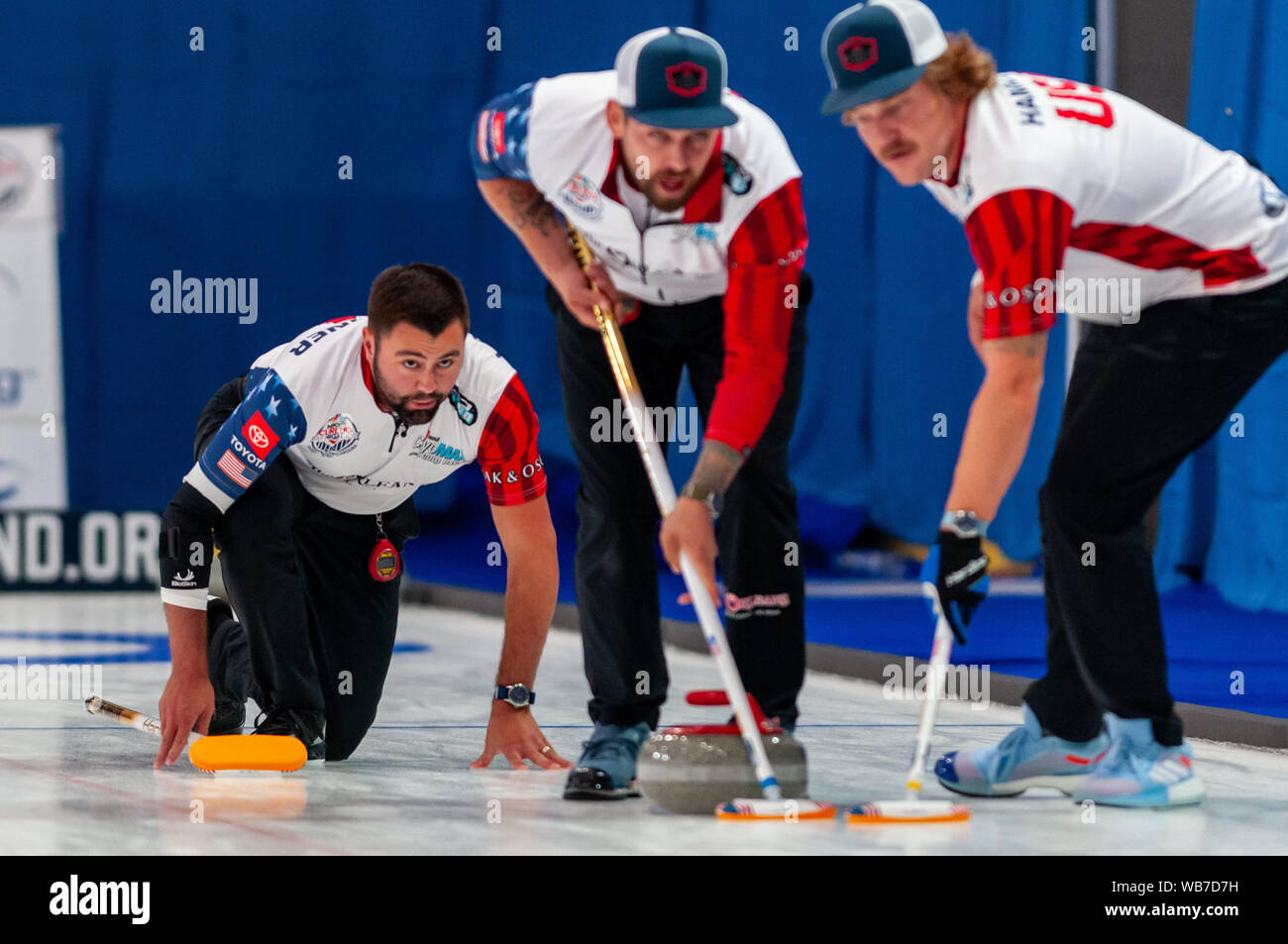 Raleigh, North Carolina, USA. 24th Aug, 2019. Aug. 24, 2019 Ã RALEIGH, N.C., US - JOHN LANDSTEINER, left, CHRIS PLYS, center, and MATT HAMILTON of the United States in action during Curling Night in America at the Raleigh Ice Plex. Curling Night in America featured members of the U.S. Olympic menÃs gold medal team from the 2018 Winter Olympics in South Korea, the U.S. womenÃs team, as well as teams from Italy, Japan, and Scotland, Aug. 22-24, 2019. Credit: Timothy L. Hale/ZUMA Wire/Alamy Live News Stock Photo