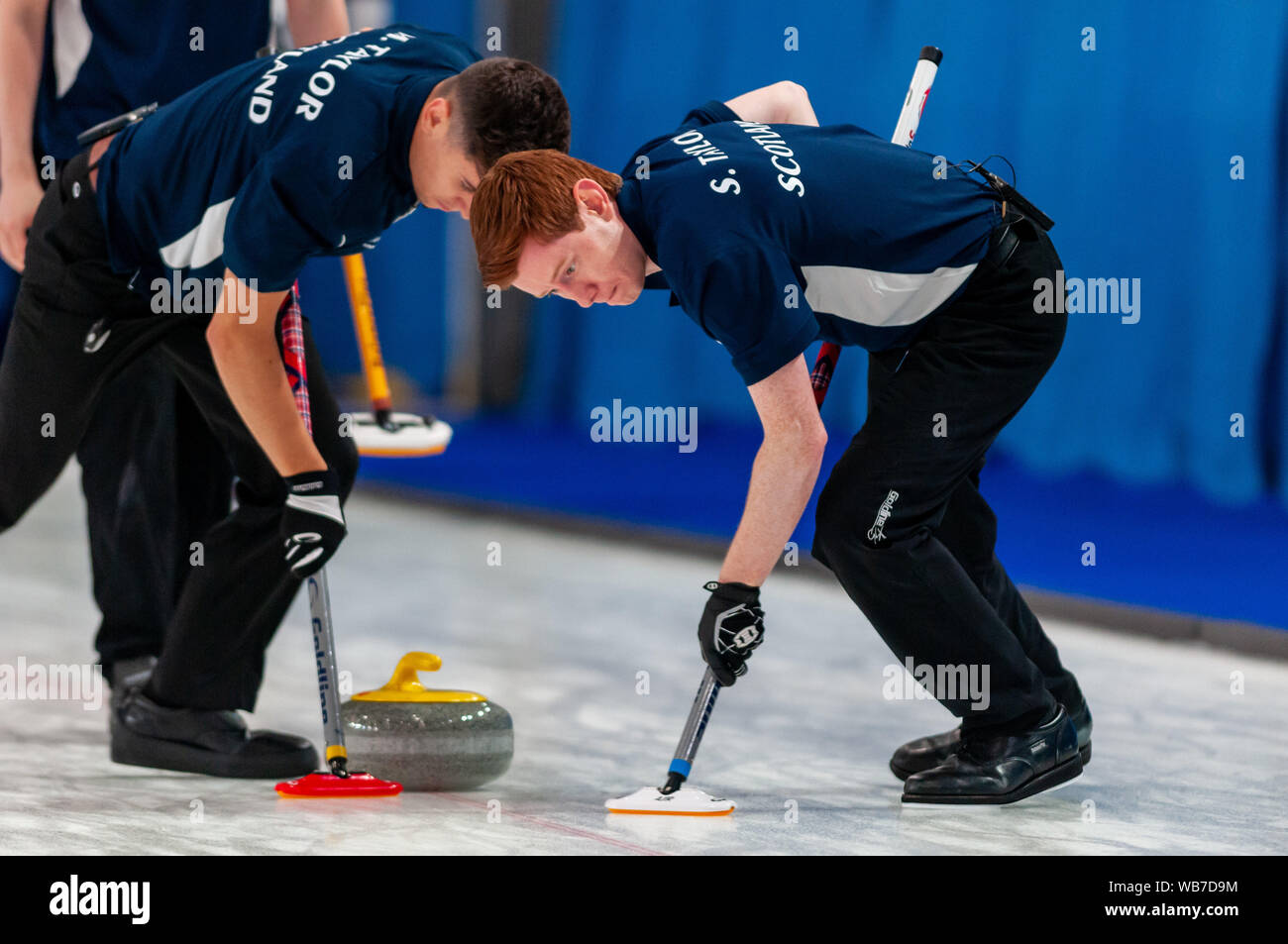 Raleigh, North Carolina, USA. 24th Aug, 2019. Aug. 24, 2019 Ã RALEIGH, N.C., US - MARK TAYLOR and STUART TAYLOR of Scotland in action during Curling Night in America at the Raleigh Ice Plex. Curling Night in America featured members of the U.S. Olympic menÃs gold medal team from the 2018 Winter Olympics in South Korea, the U.S. womenÃs team, as well as teams from Italy, Japan, and Scotland, Aug. 22-24, 2019. Credit: Timothy L. Hale/ZUMA Wire/Alamy Live News Stock Photo