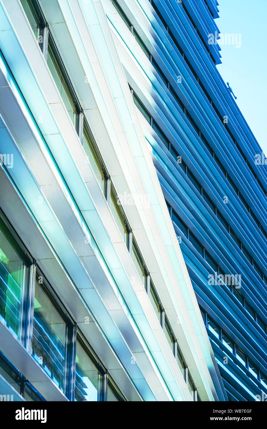 Futuristic modern architecture of the glass and steel skyscraper Stock ... - Parallel And Sleek Steel And Glass Skyscraper Architecture