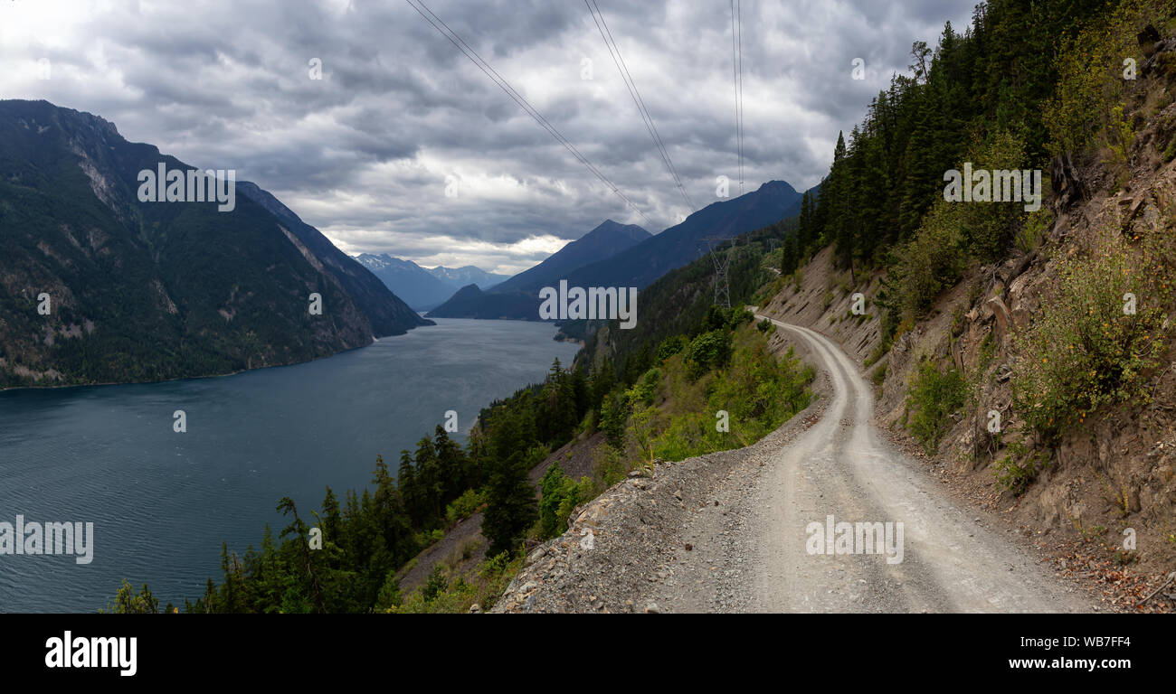 Beautiful Panoramic view of a Dirt Road in the Mountain Valley near a ...